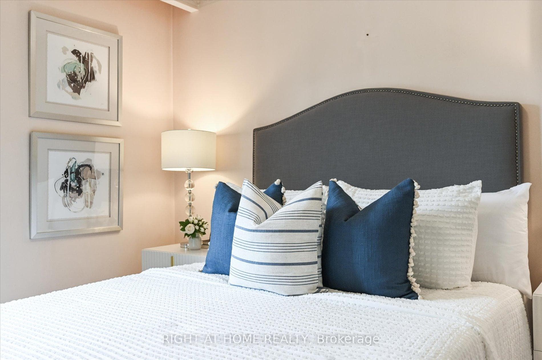 Primary Bedroom with hardwood & his/hers closets