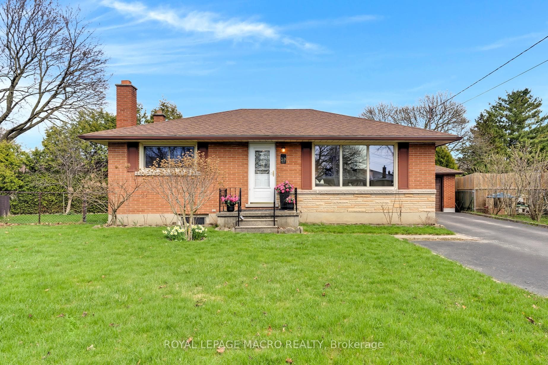 Front of home on wide pie shaped lot
