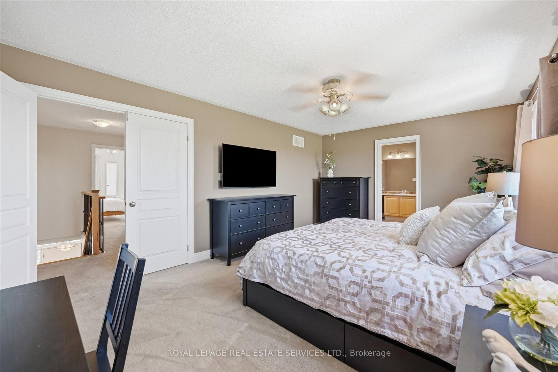 Primary Bedroom w/a Walk-In Closet & 5-PC Ensuite