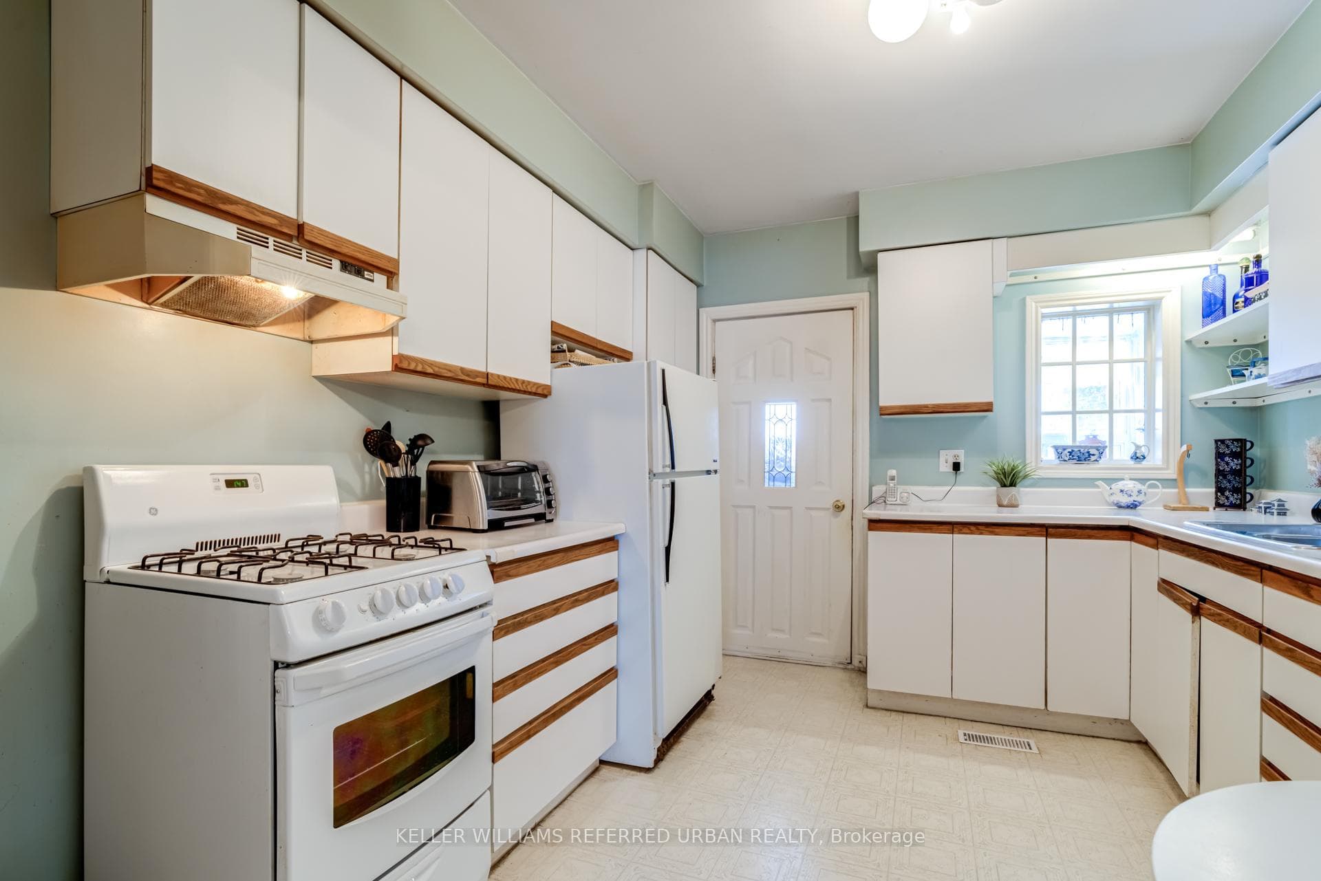 Kitchen w/ walk out to Covered Porch