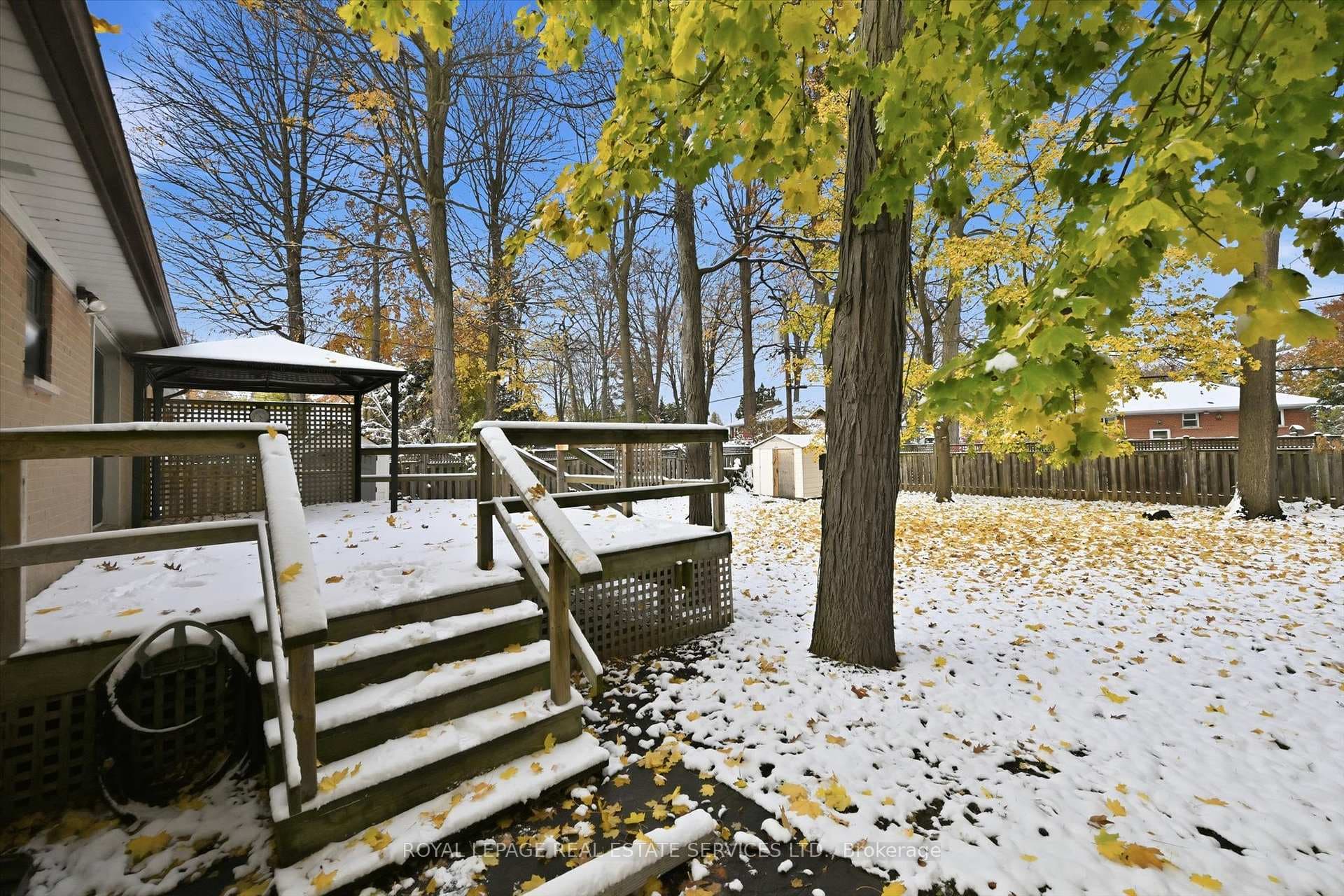Shared Backyard Offers an Expansive Deck w/Cabana