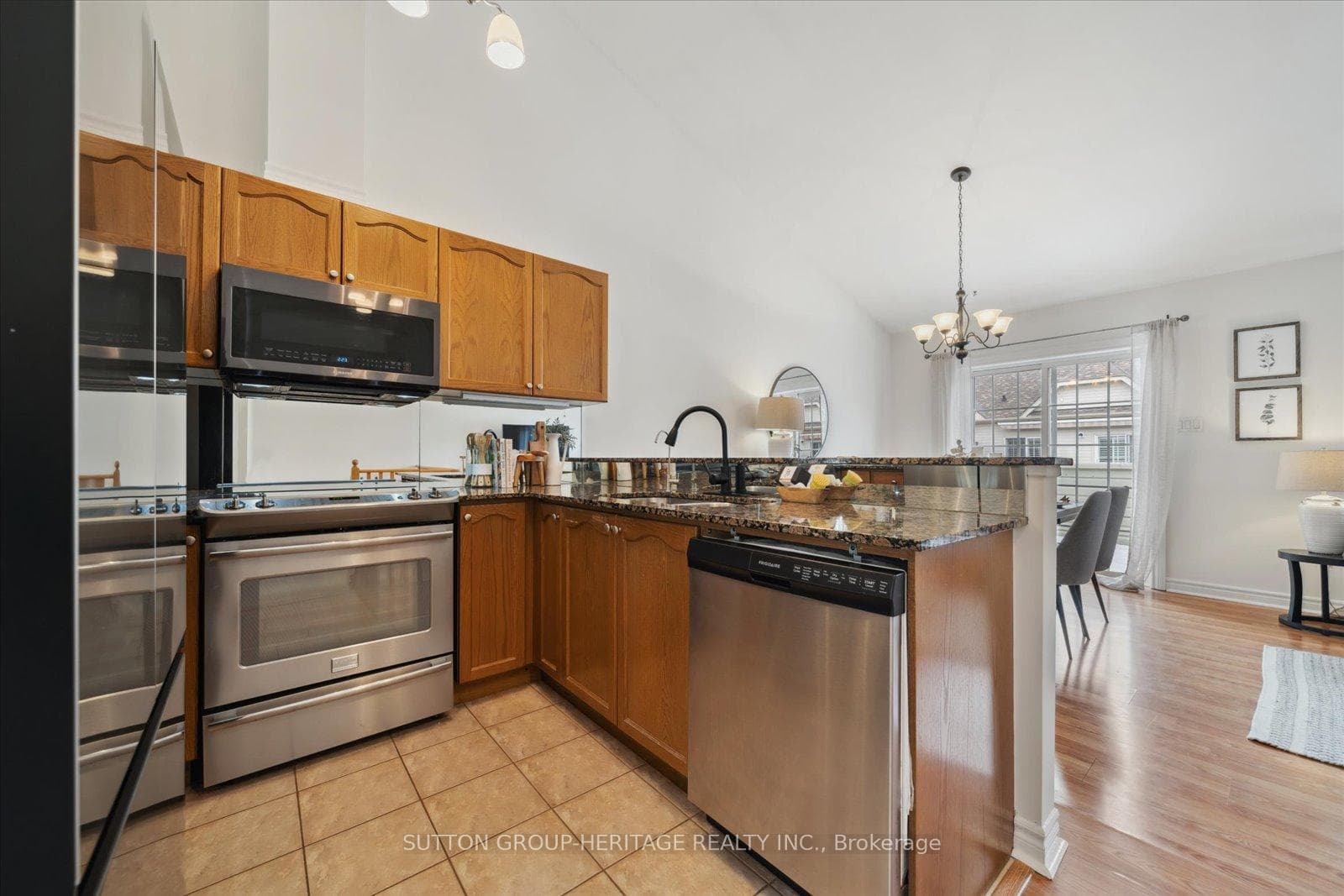 Kitchen overlooks Living Spaces