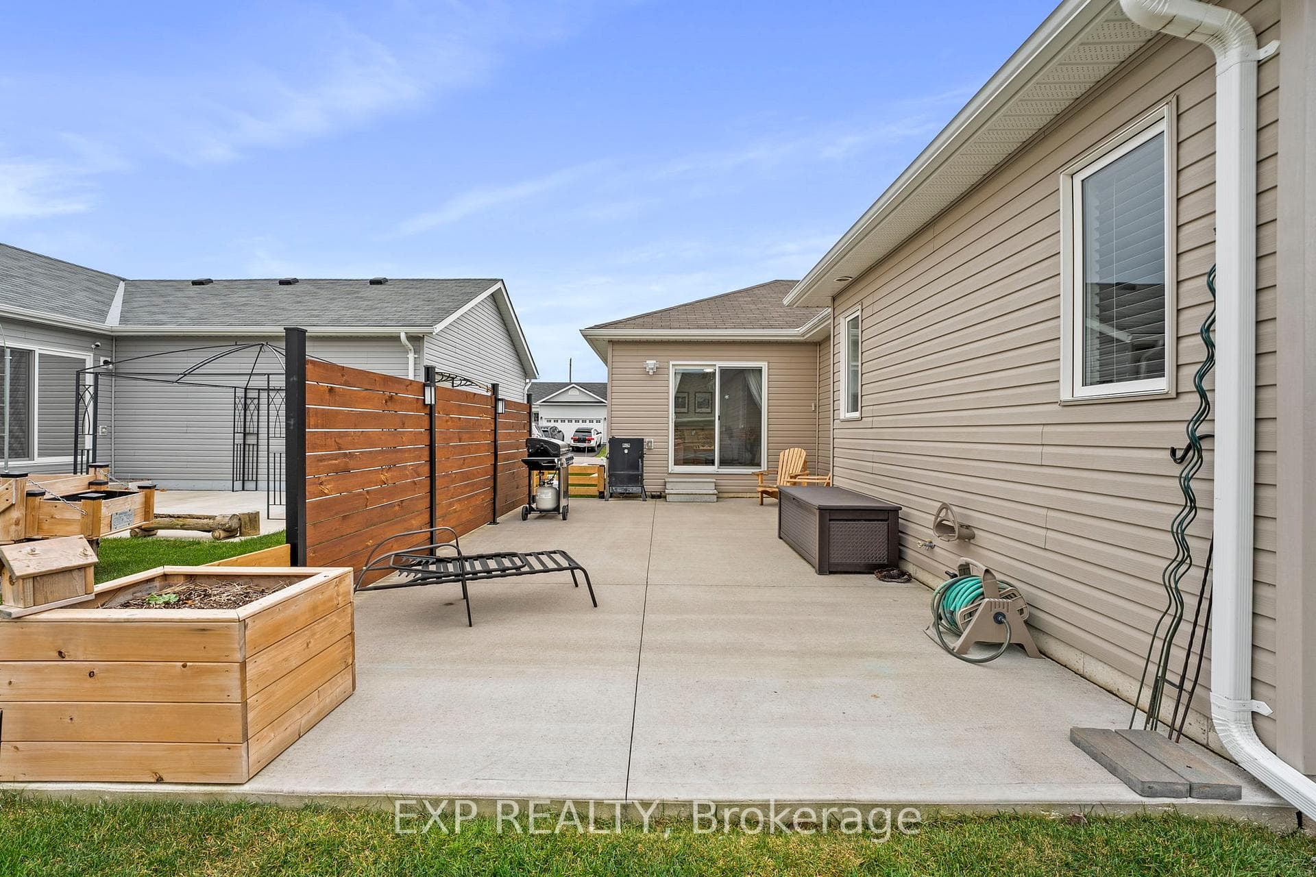 Walk-Out To Patio From Sunroom