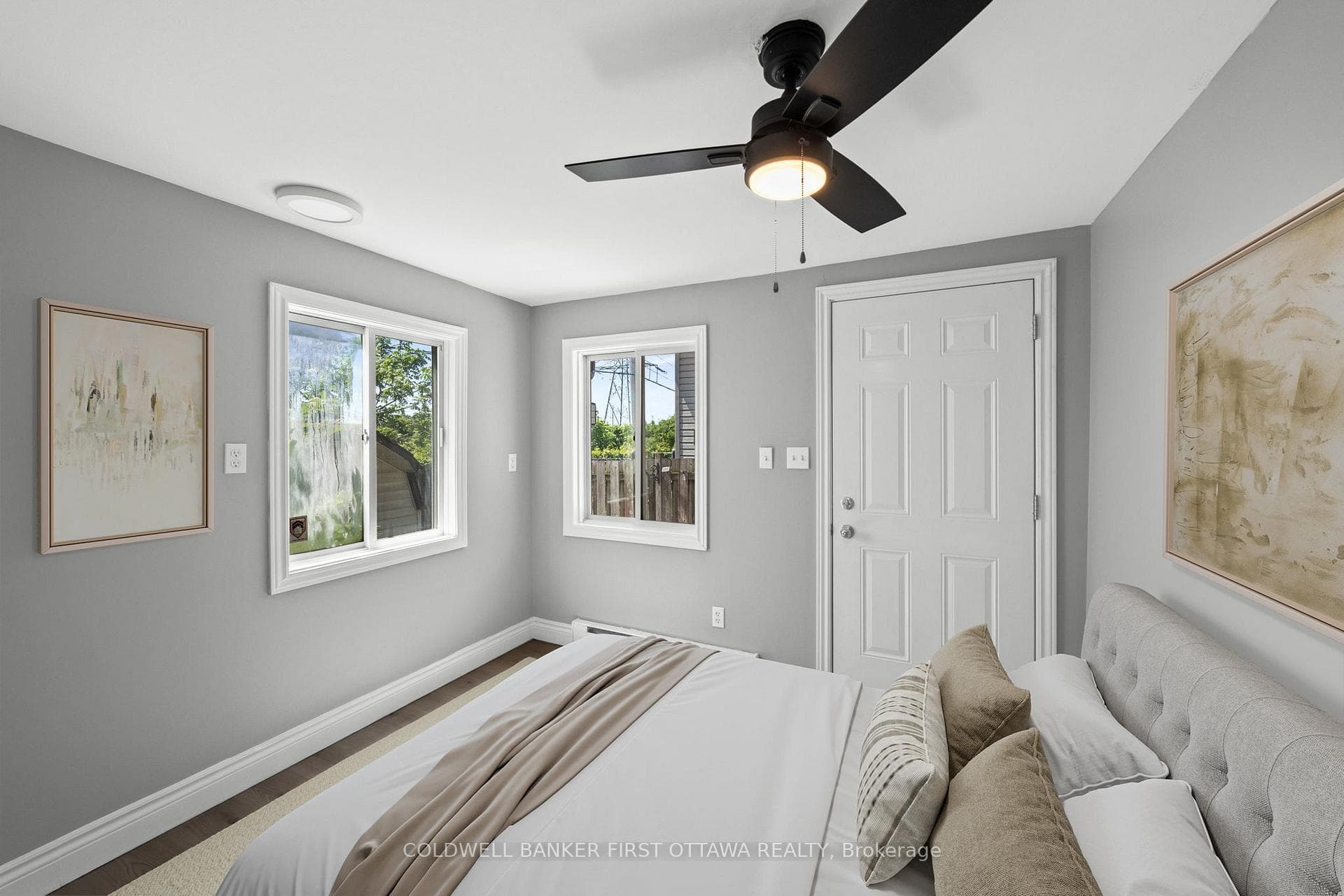 Back right bedroom (virtually staged). Separate dr