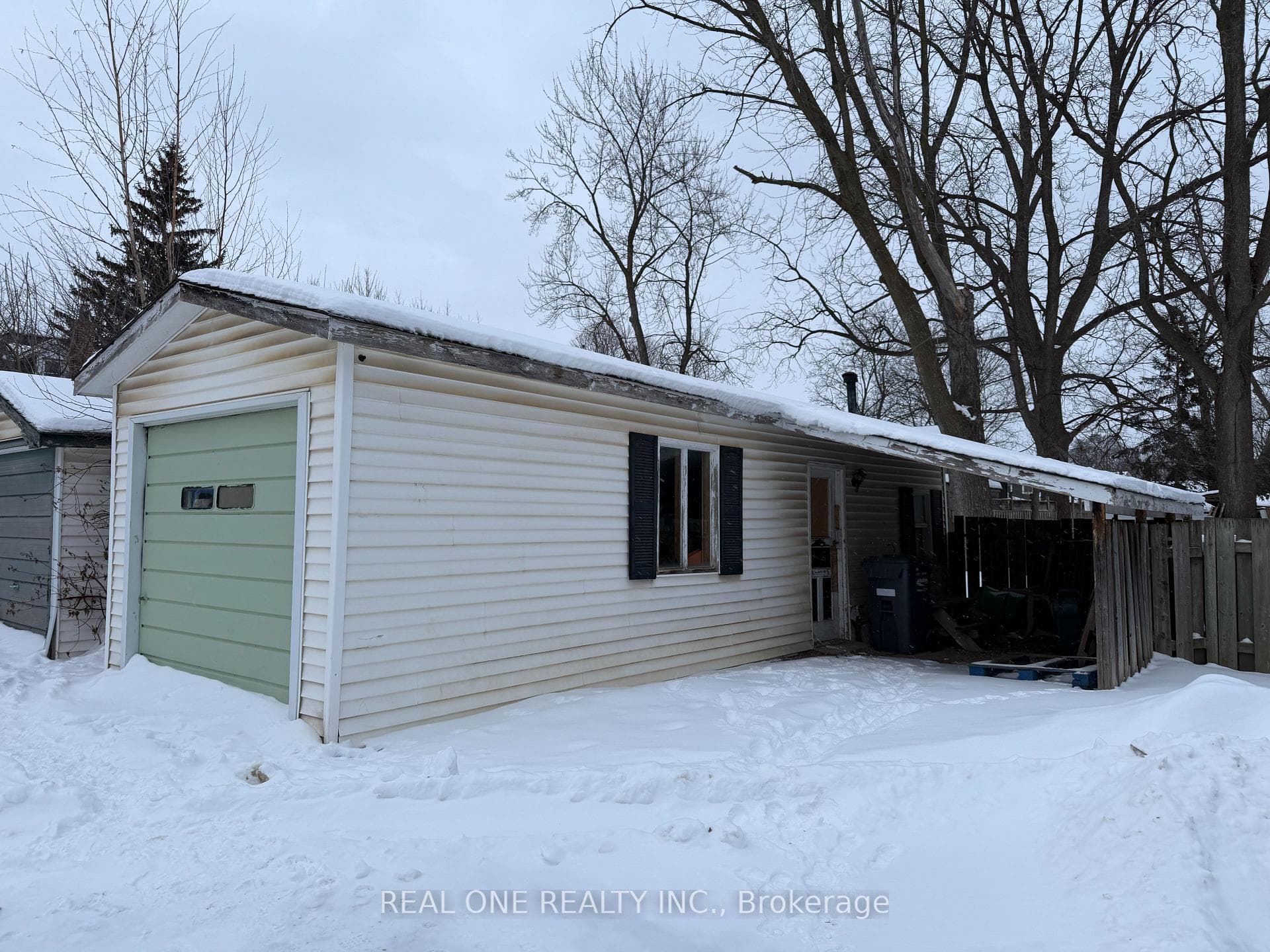 Detached garage & shed