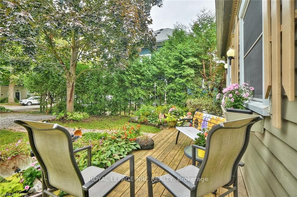 The front porch overlooking the yard and family fr