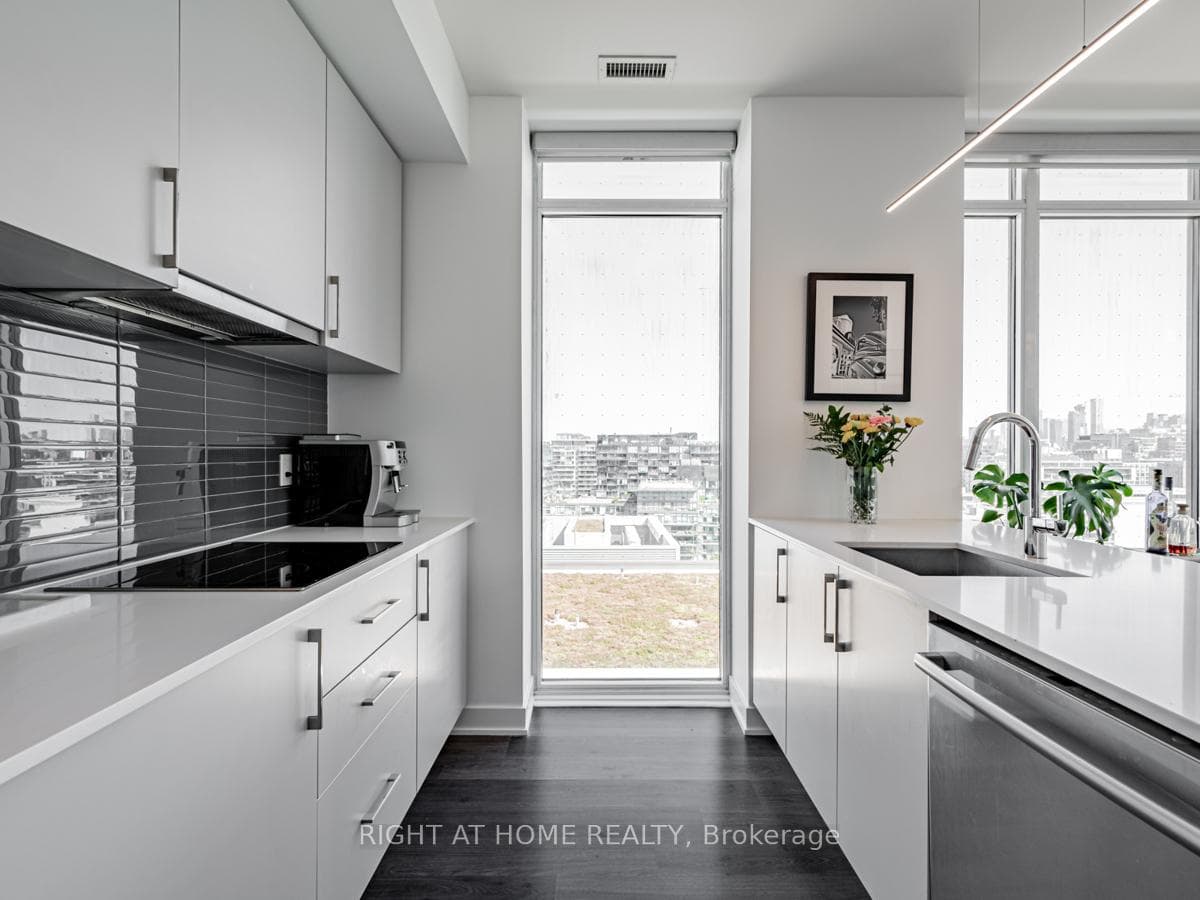 Designer Kitchen w Floor to Ceiling Window