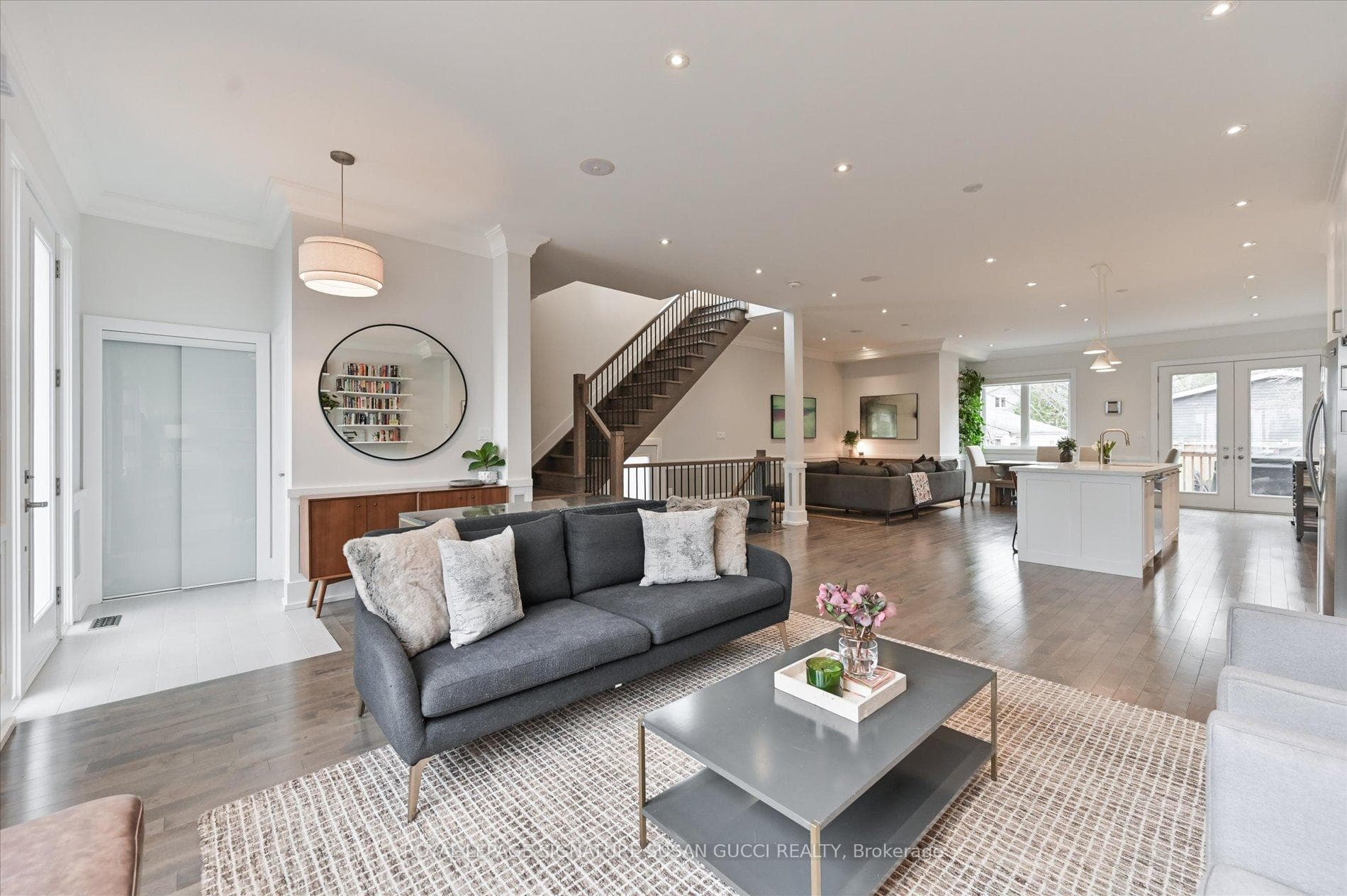 Soaring ceilings, bright open-concept design