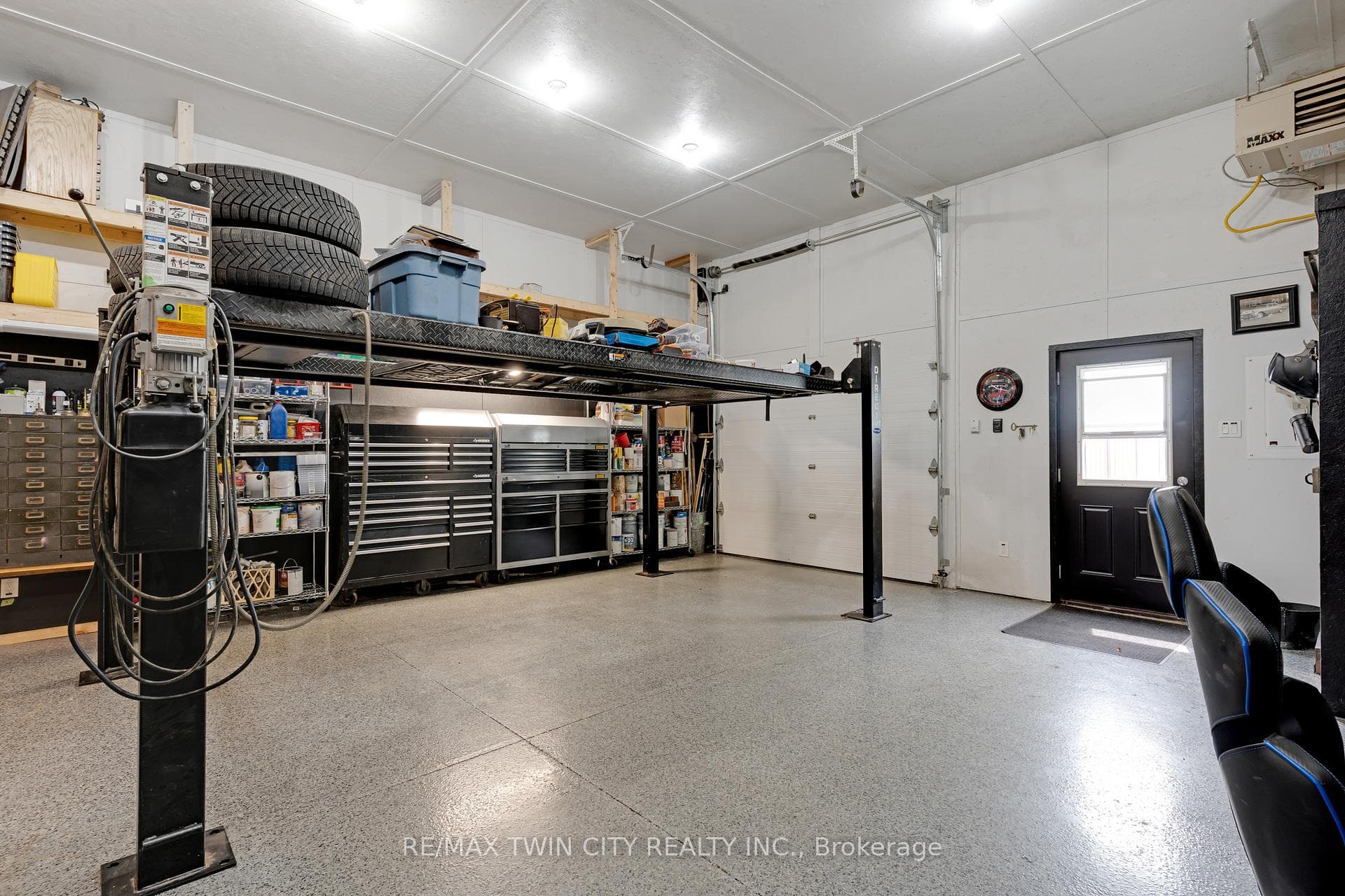 Garage with 2 piece bath, sink and 2nd level offic