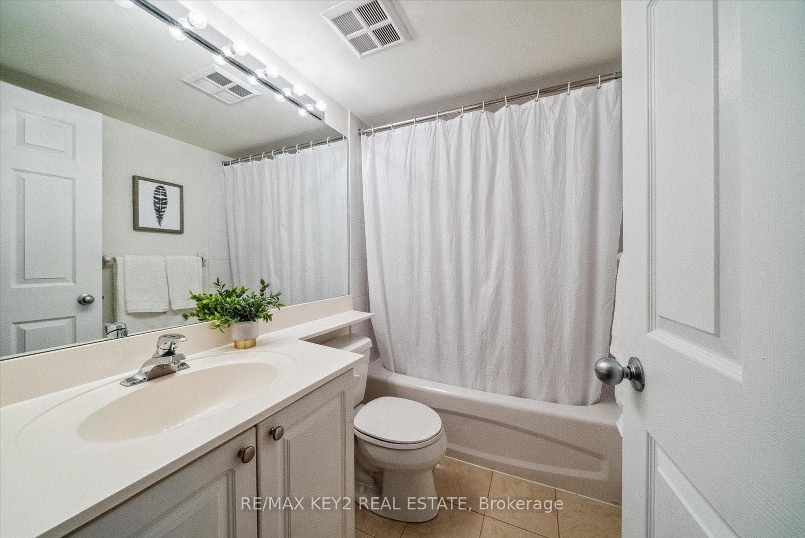 30 Harrison Garden Boulevard Unit 206 photo 4