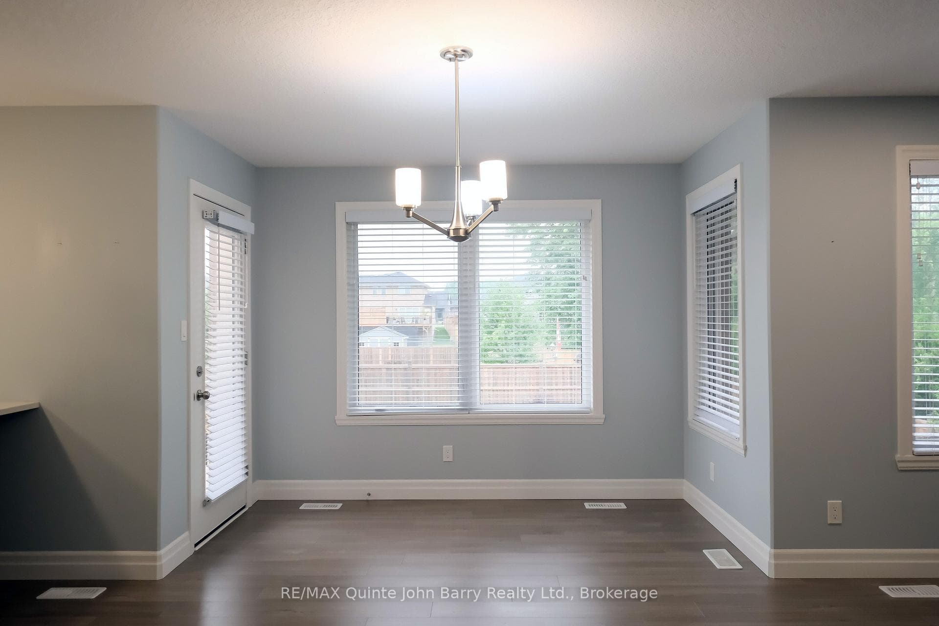 Blinds in all windows and door to rear yard