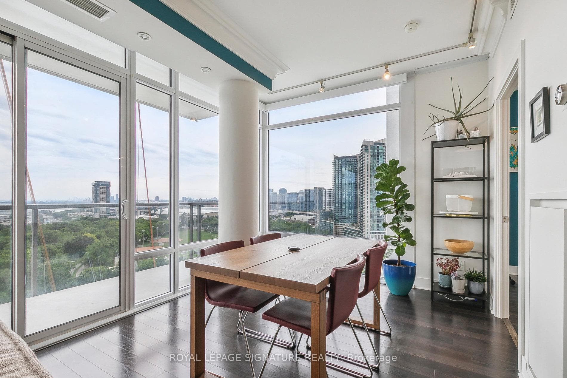 DINING ROOM - WEST & CITY VIEWS. PICTURE WINDOW.