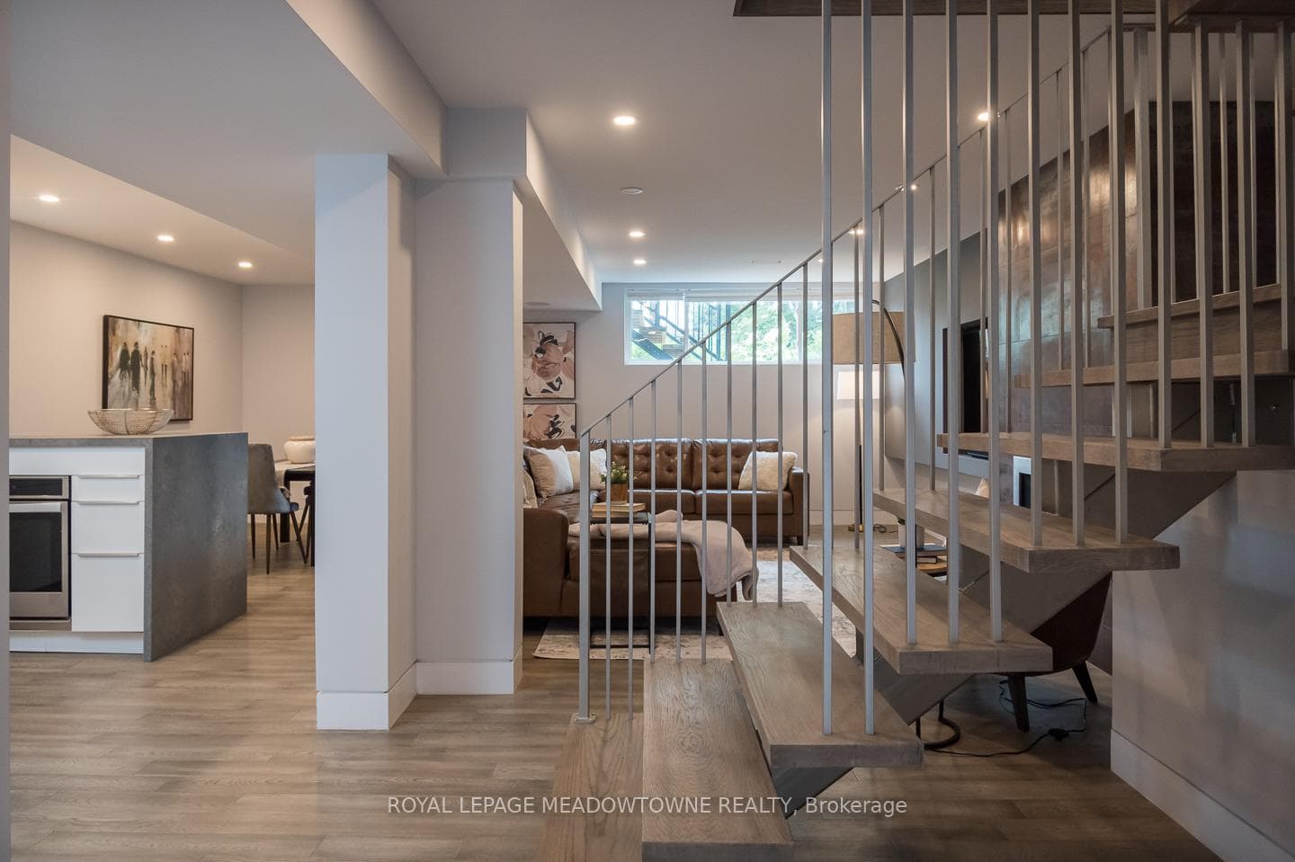 Custom modern railing & high lower ceilings