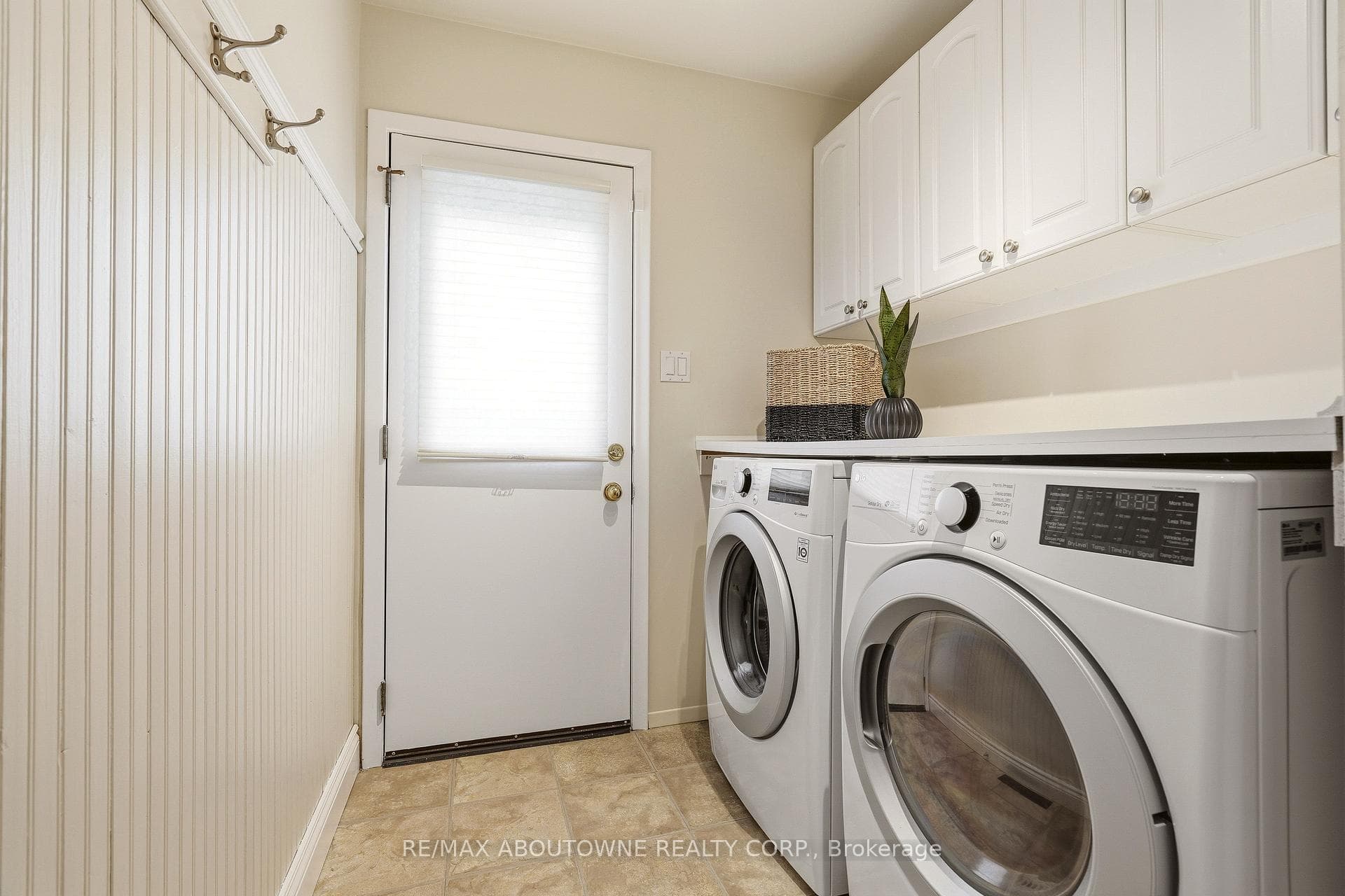 main floor laundry w backyard access