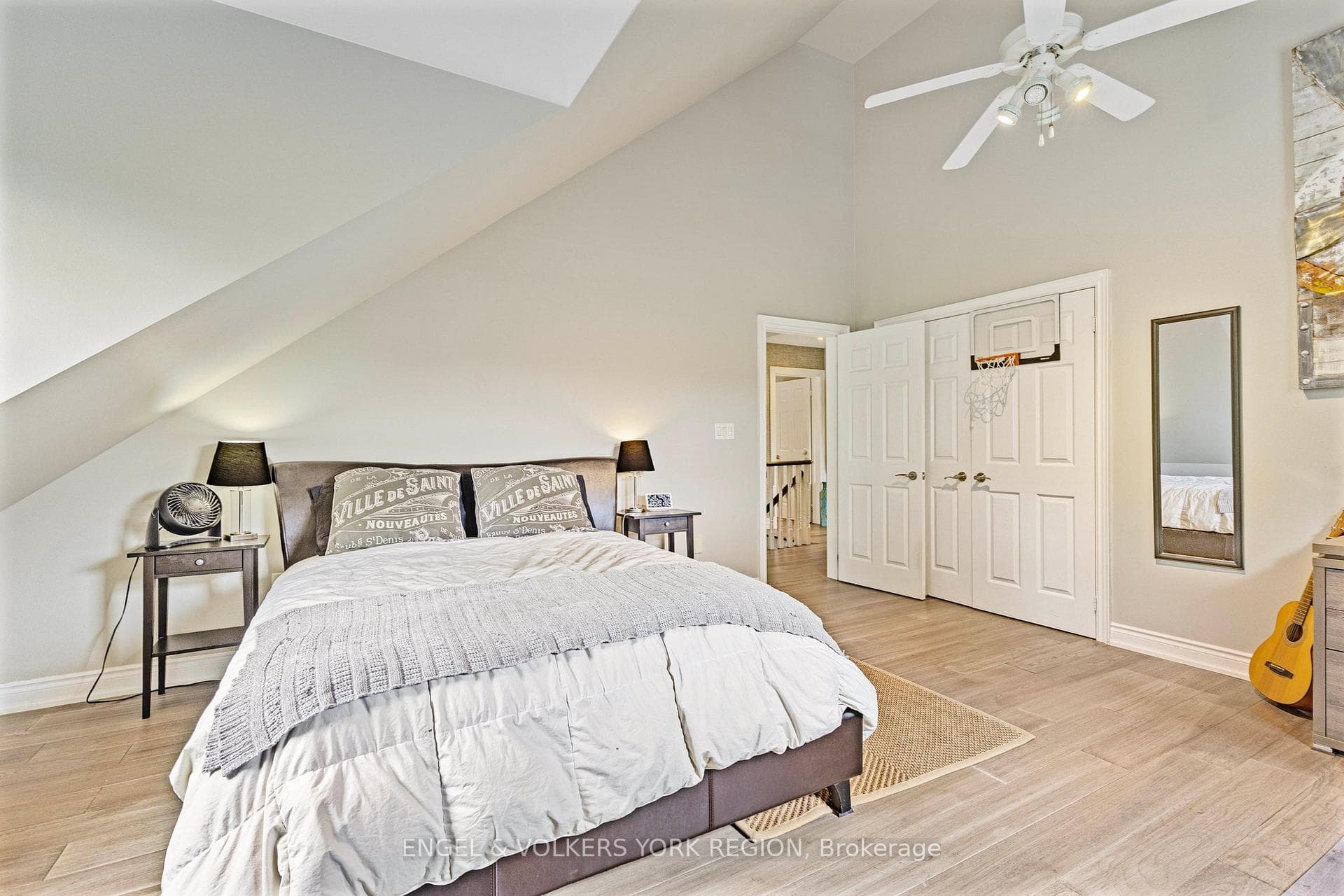 Bedroom 3 with double closet & vaulted ceiling