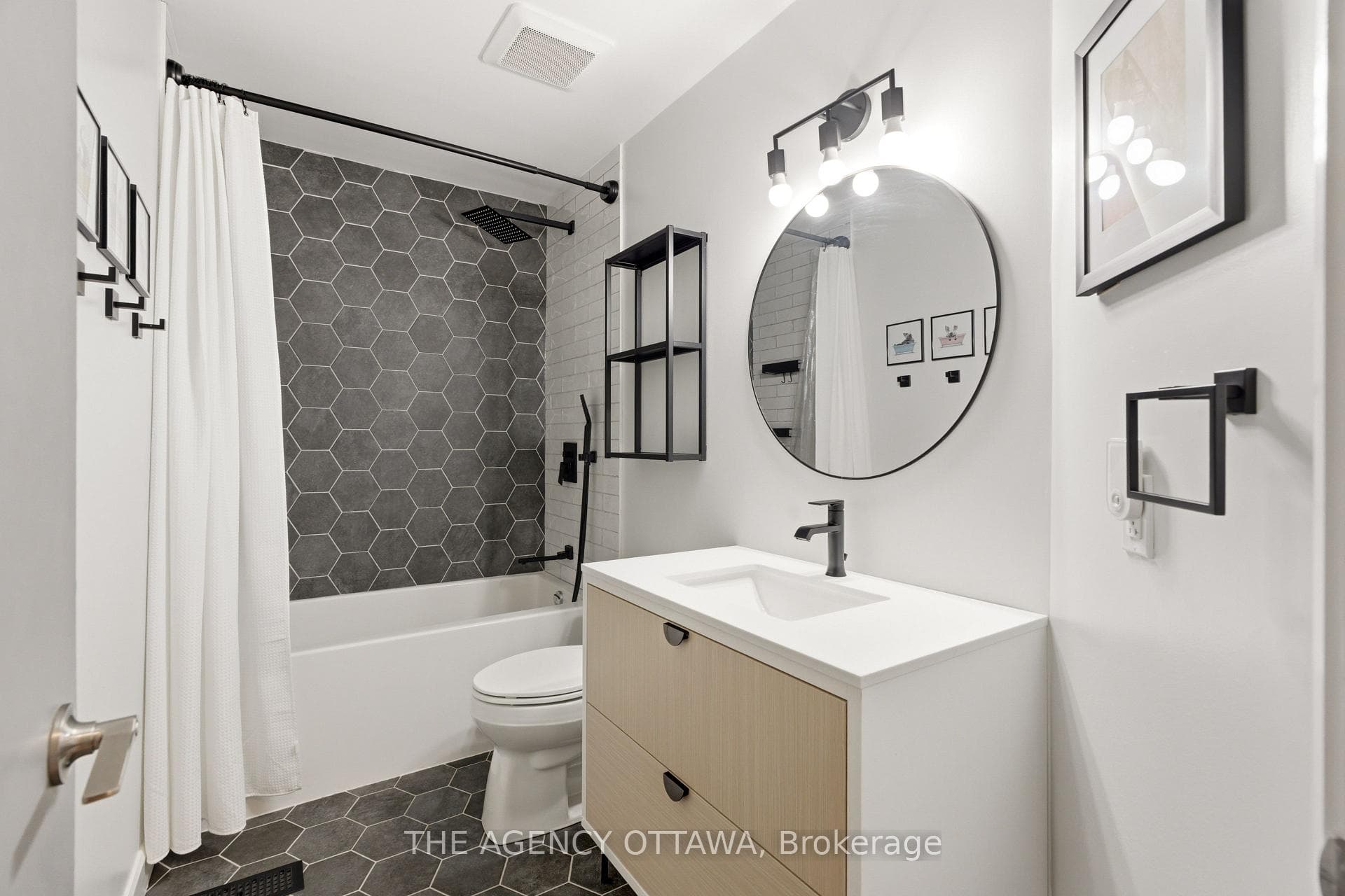 Full bath with hex tile, soaker tub and renovated