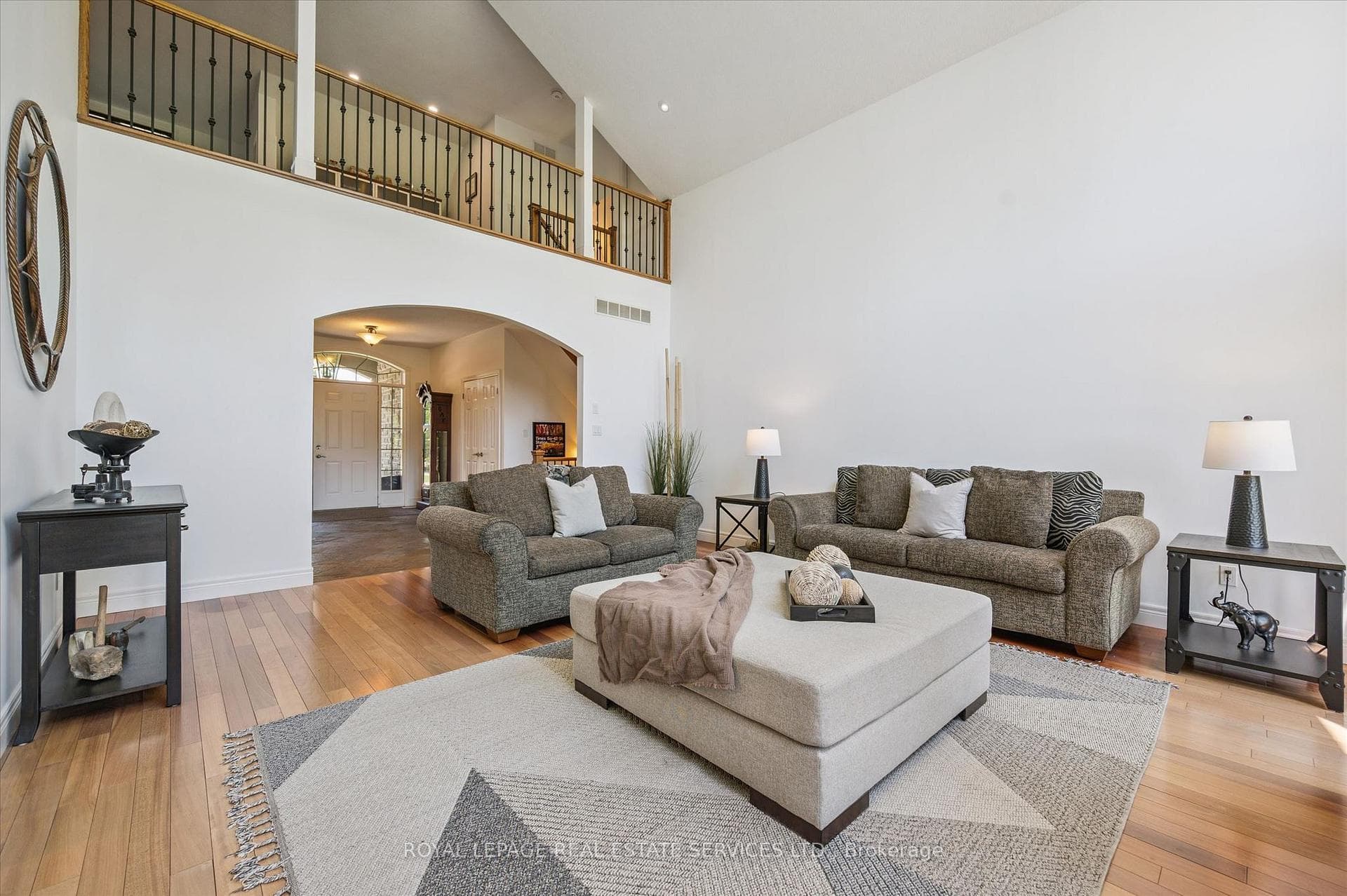 Dramatic Living Room w/a Soaring Vaulted Ceiling
