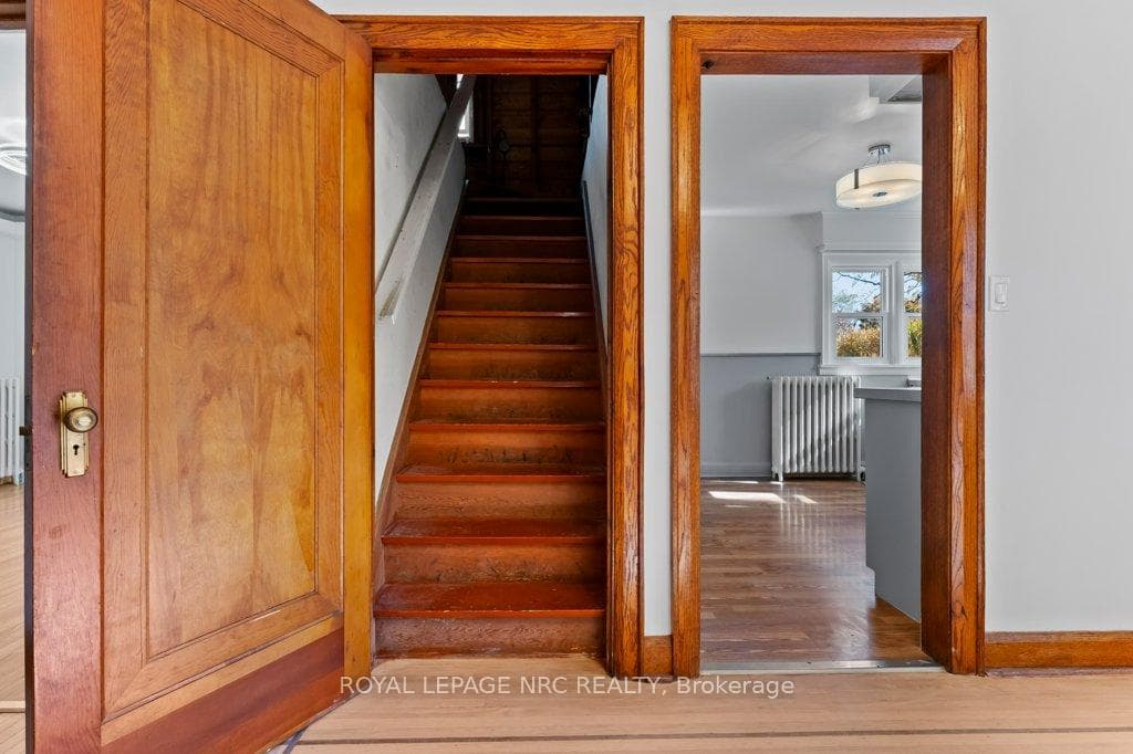 Full staircase to attic, off dining room