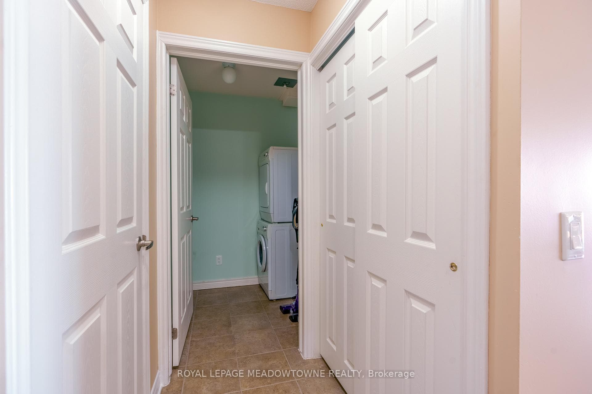 insuite laundry with staking washer & dryer
