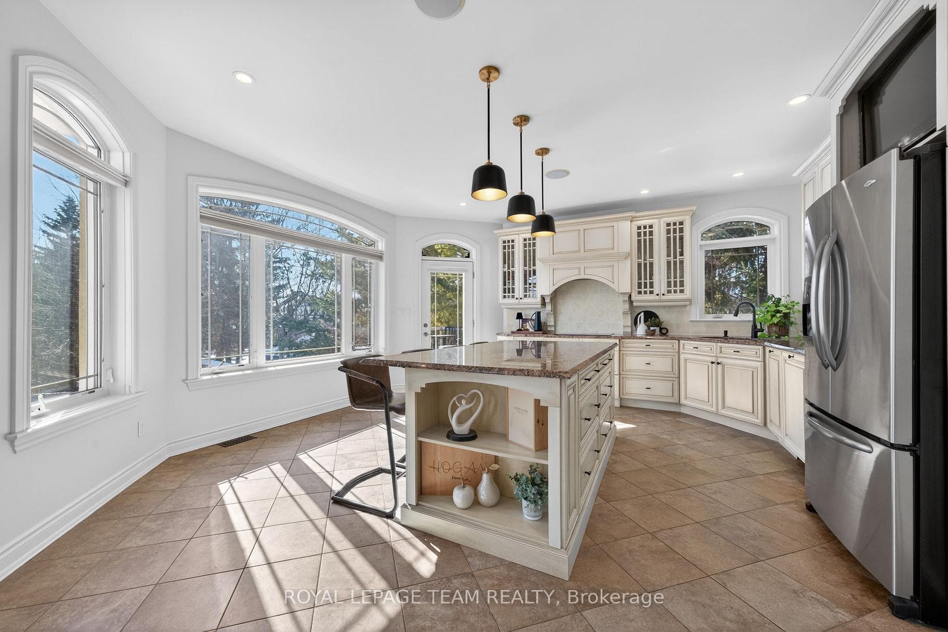 Grand kitchen with granite counters