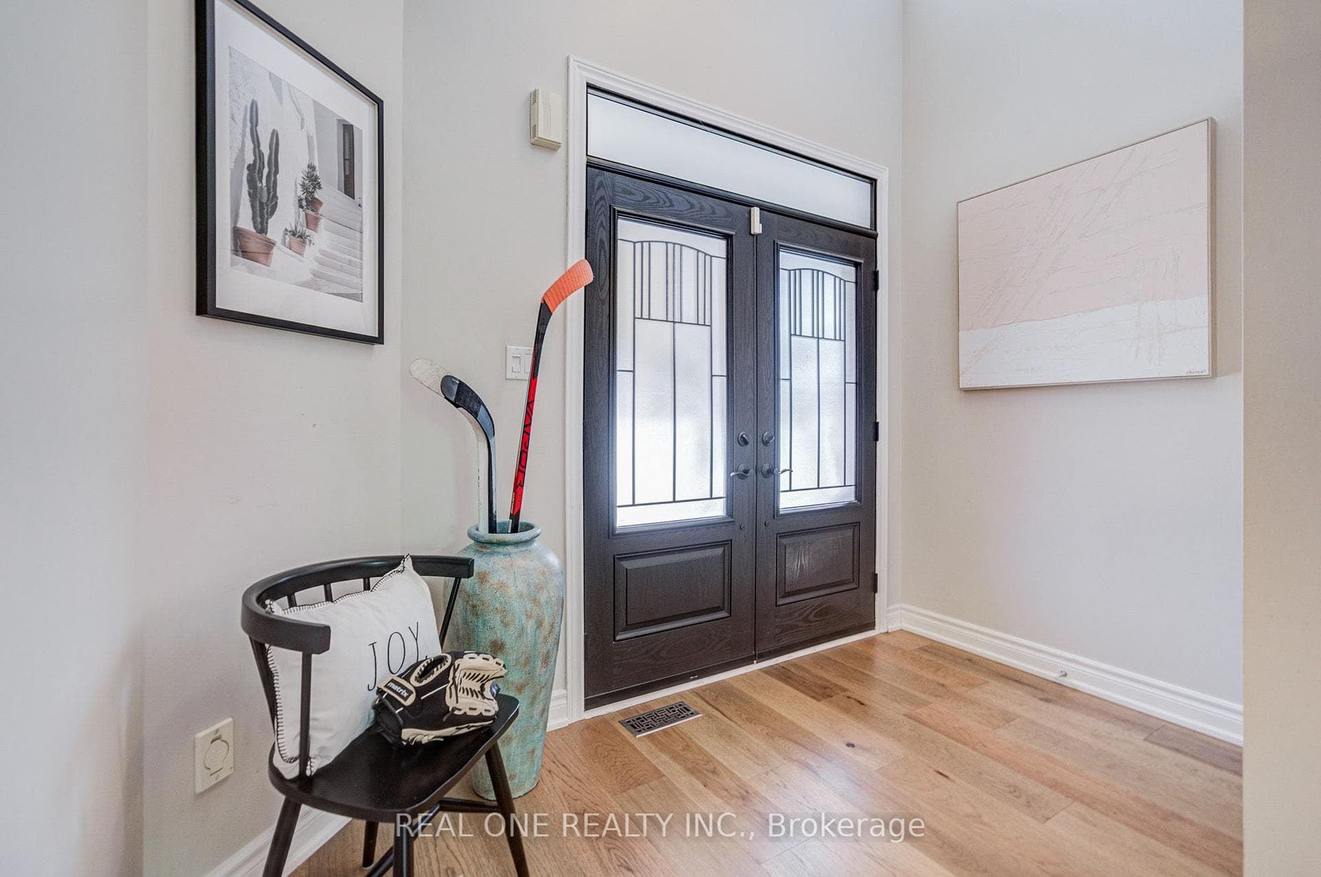 Grand Foyer w/ Soaring Ceiling & French Doors