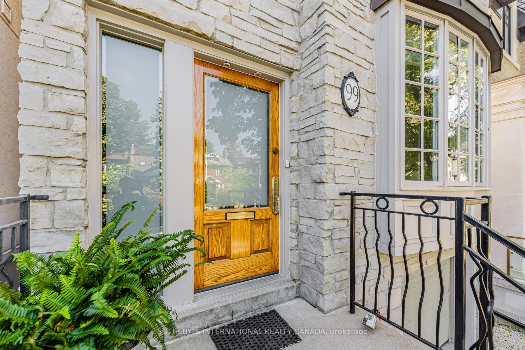 Detached two-storey with private drive & garage.