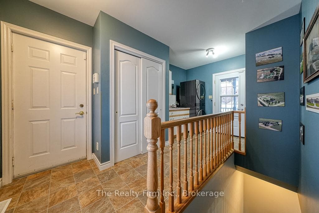 Entryway from attached garage - laundry - dining