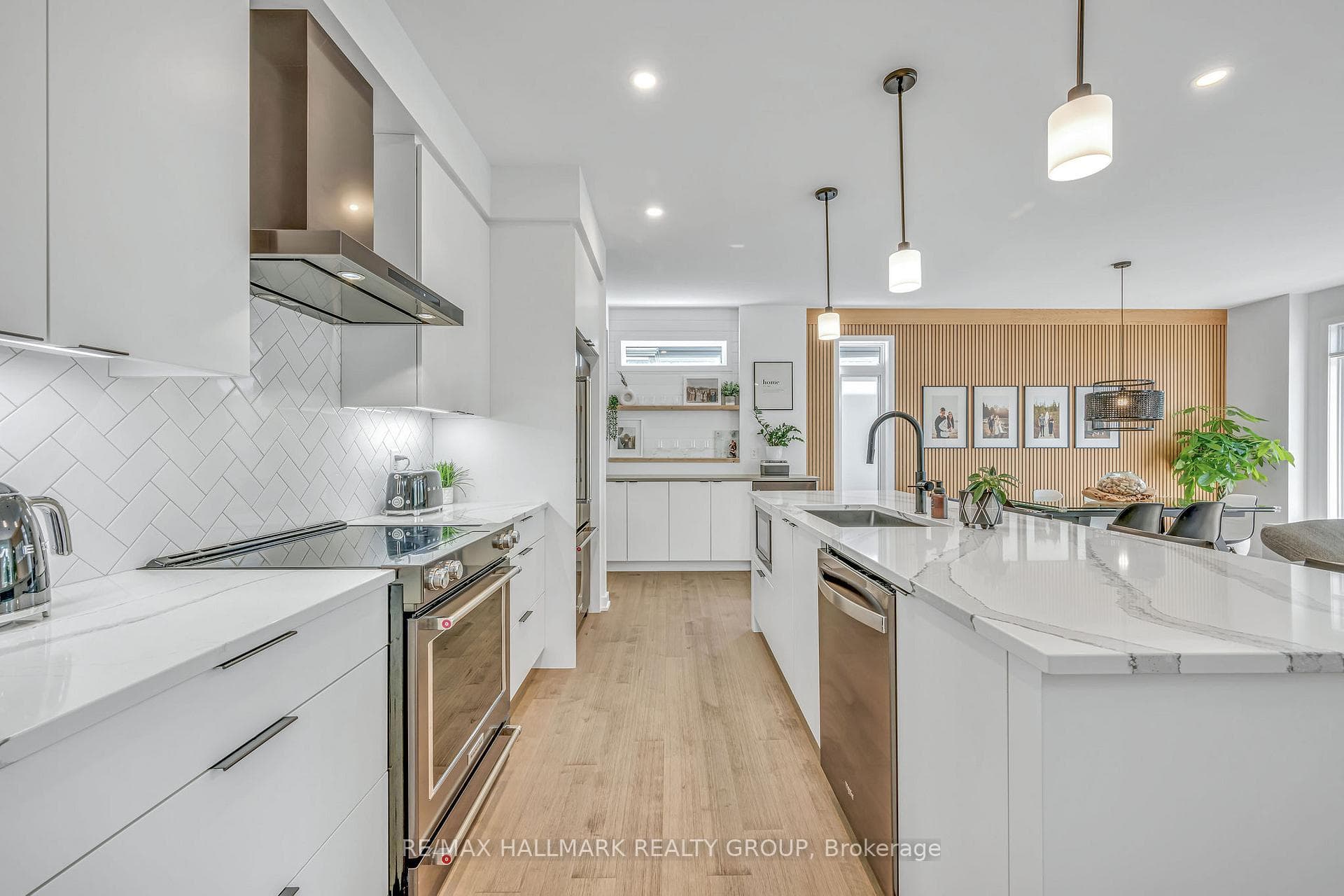 Kitchen with quartz counters and island