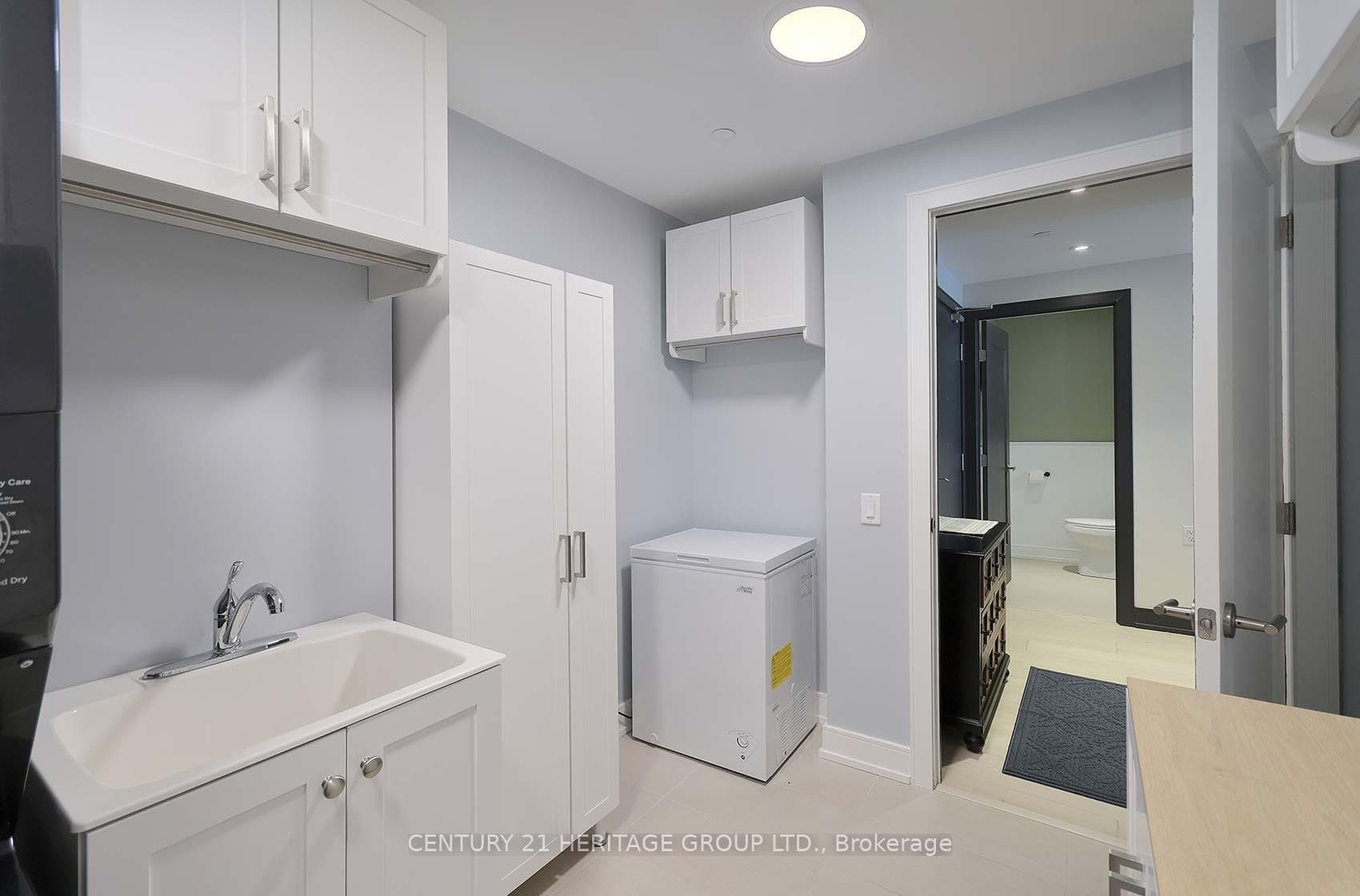 Large Utility Room With Ample Cabinetry