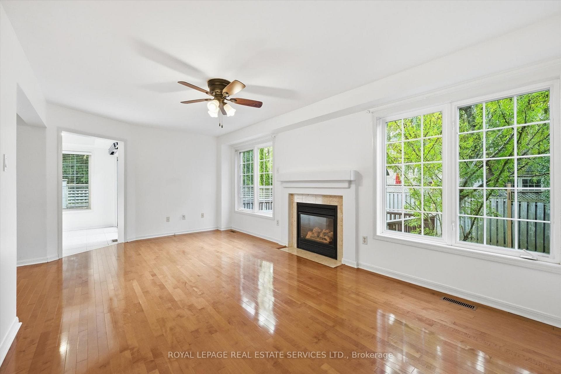 Oversized Sun-Filled Living Room w/a Gas Fireplace