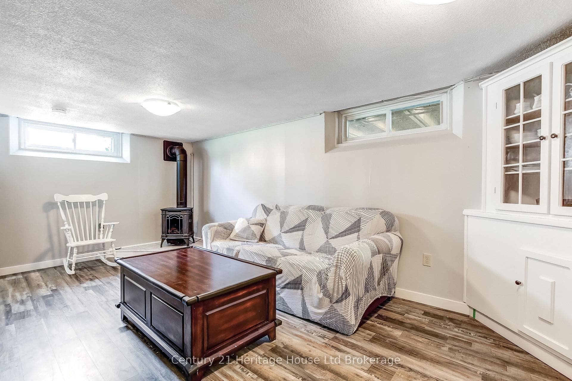Lower family room with gas fireplace