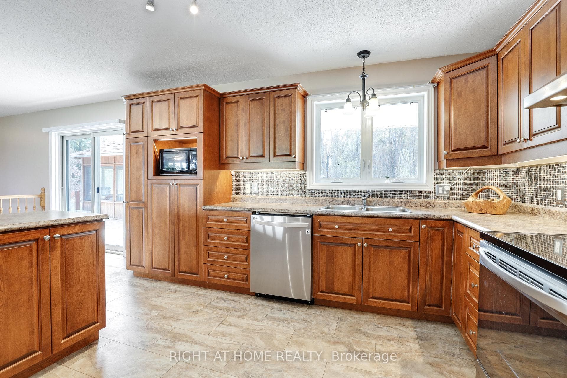 Kitchen overlooking backyard