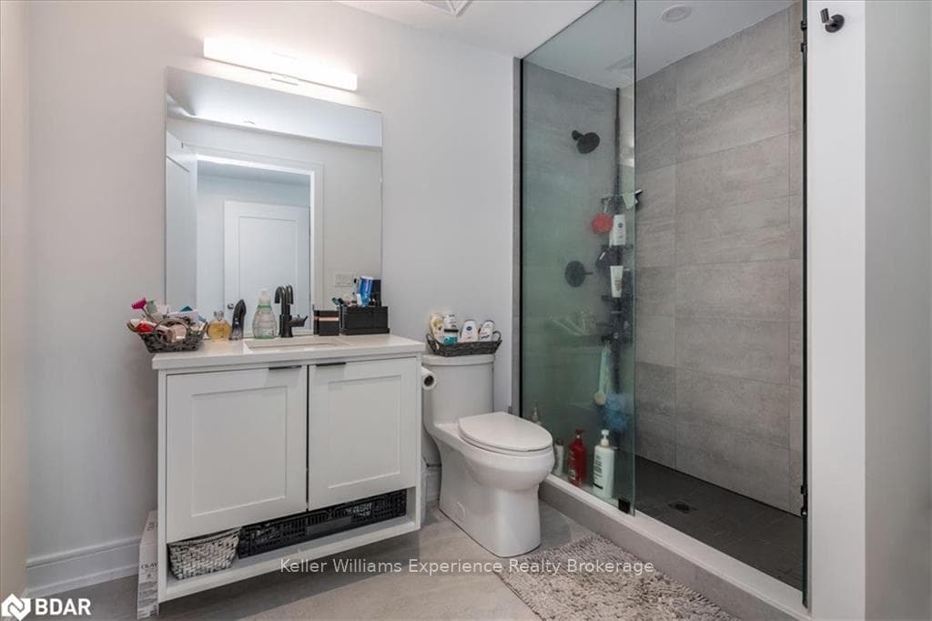 Full bathroom with vanity and toilet
