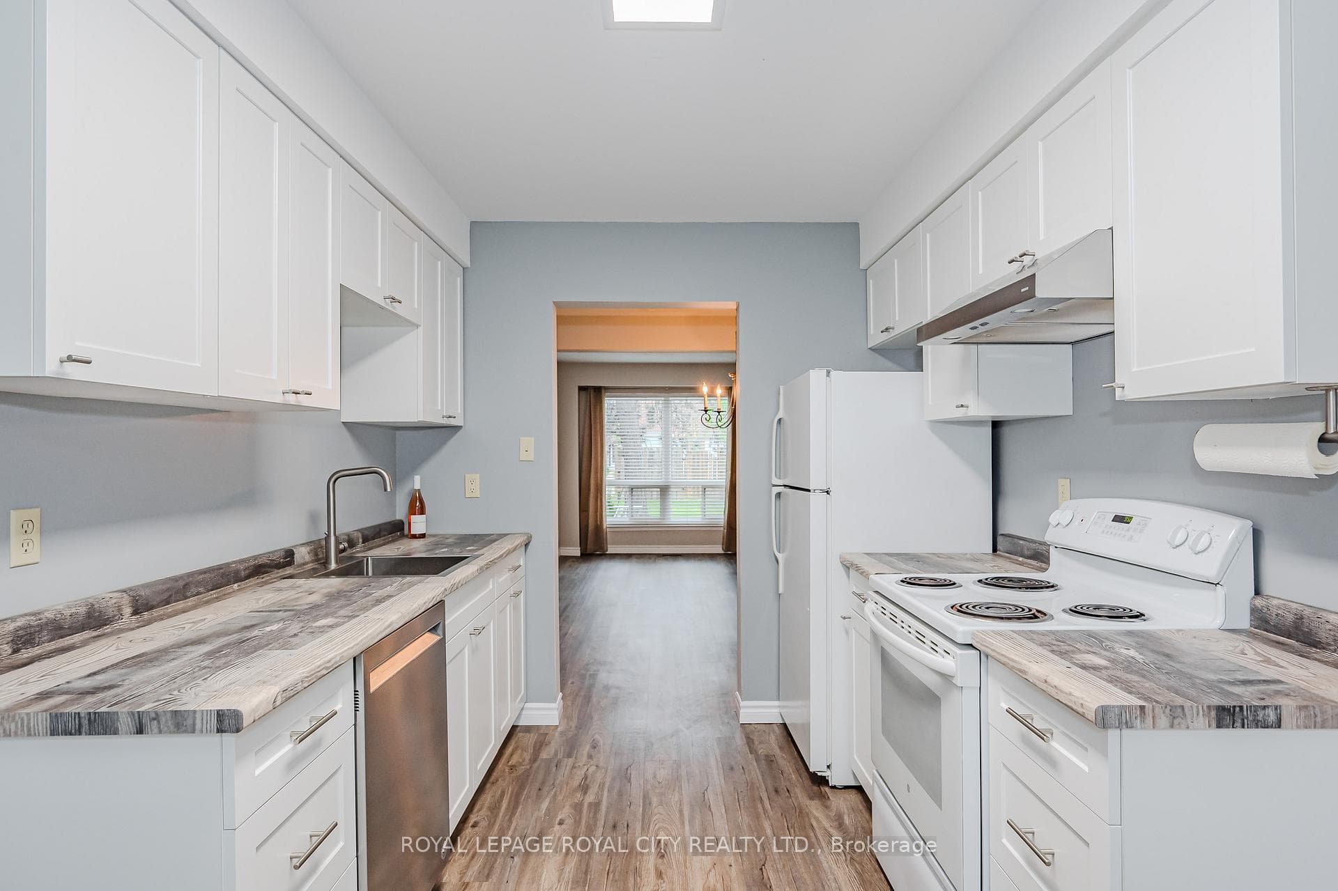 New bright white kitchen and appliances.