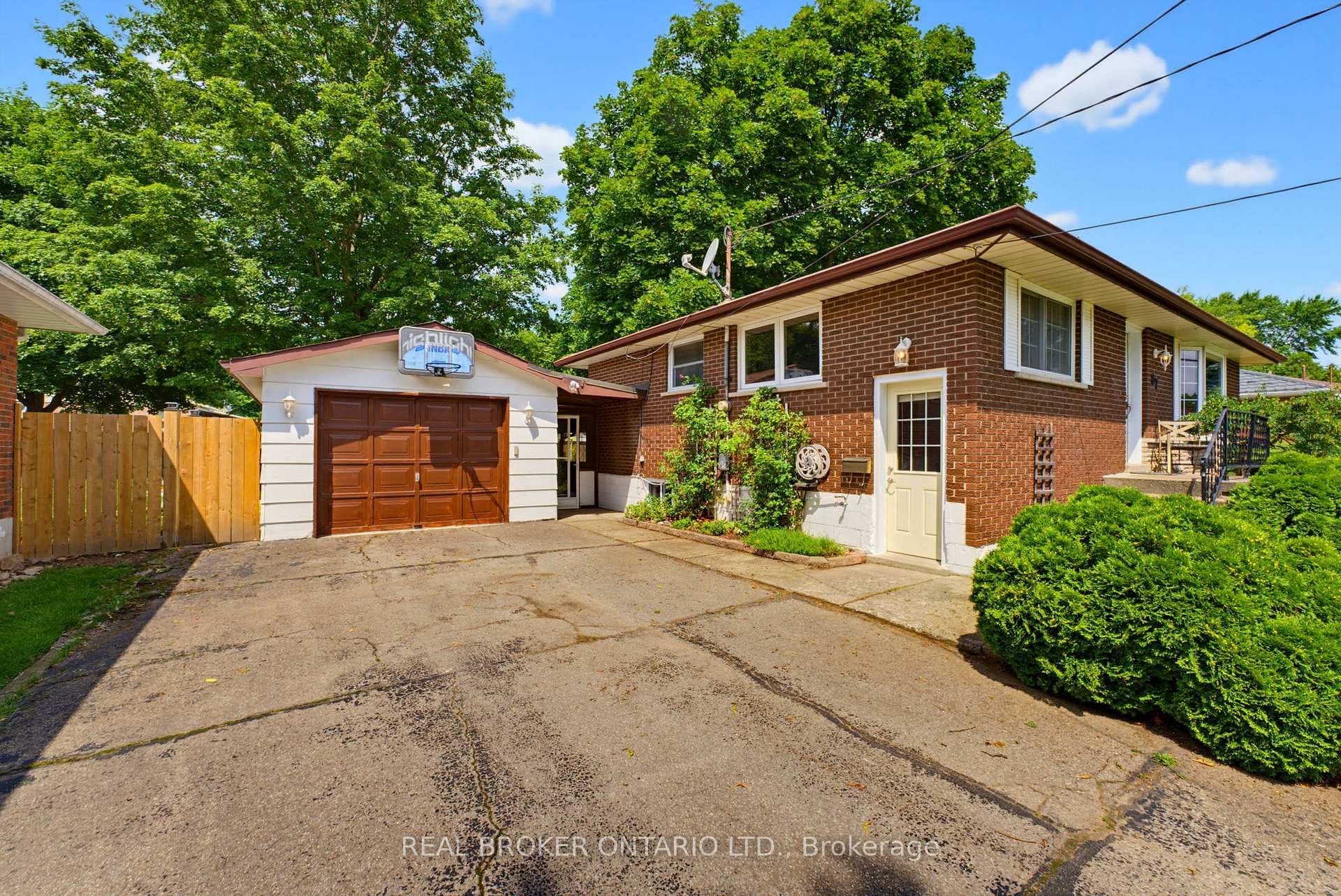 Exterior Side Entrance with Garage