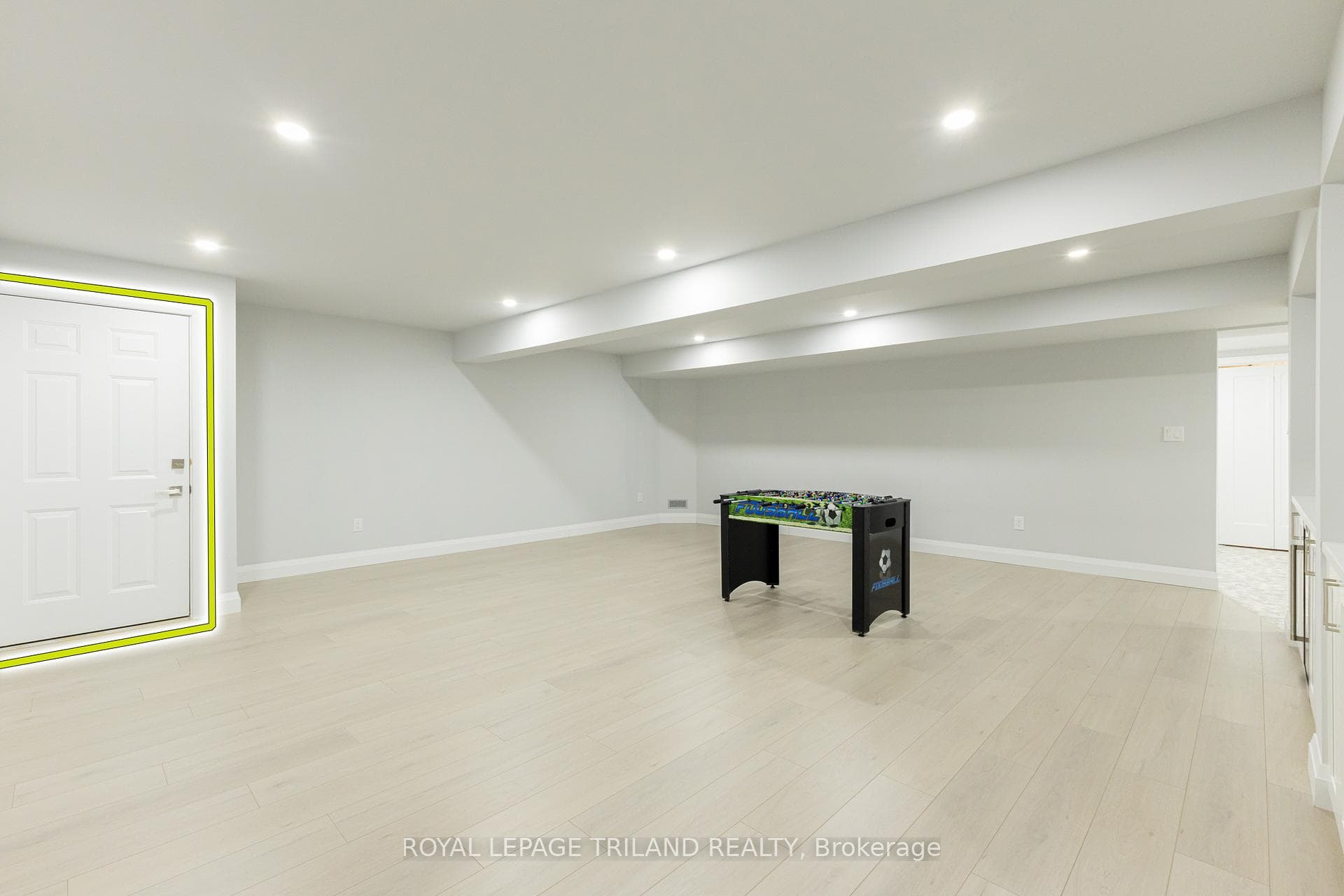 Entrance from garage staircase into family room