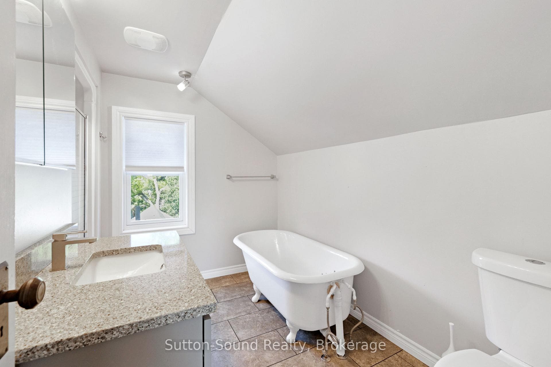 Main Bath with Clawfoot Tub and Separate Shower