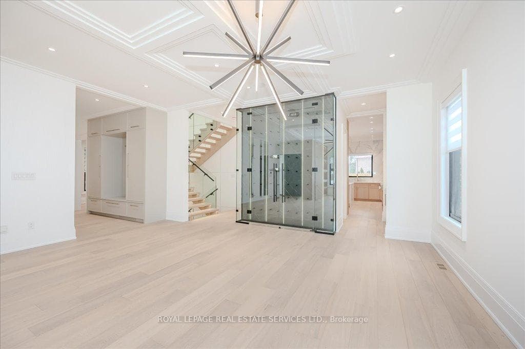 Striking Wine Cellar Between Dining Area & Kitchen