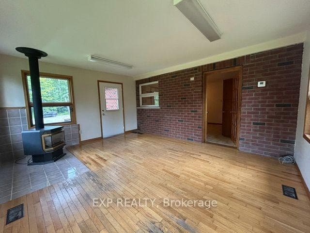 sunroom with propane stove