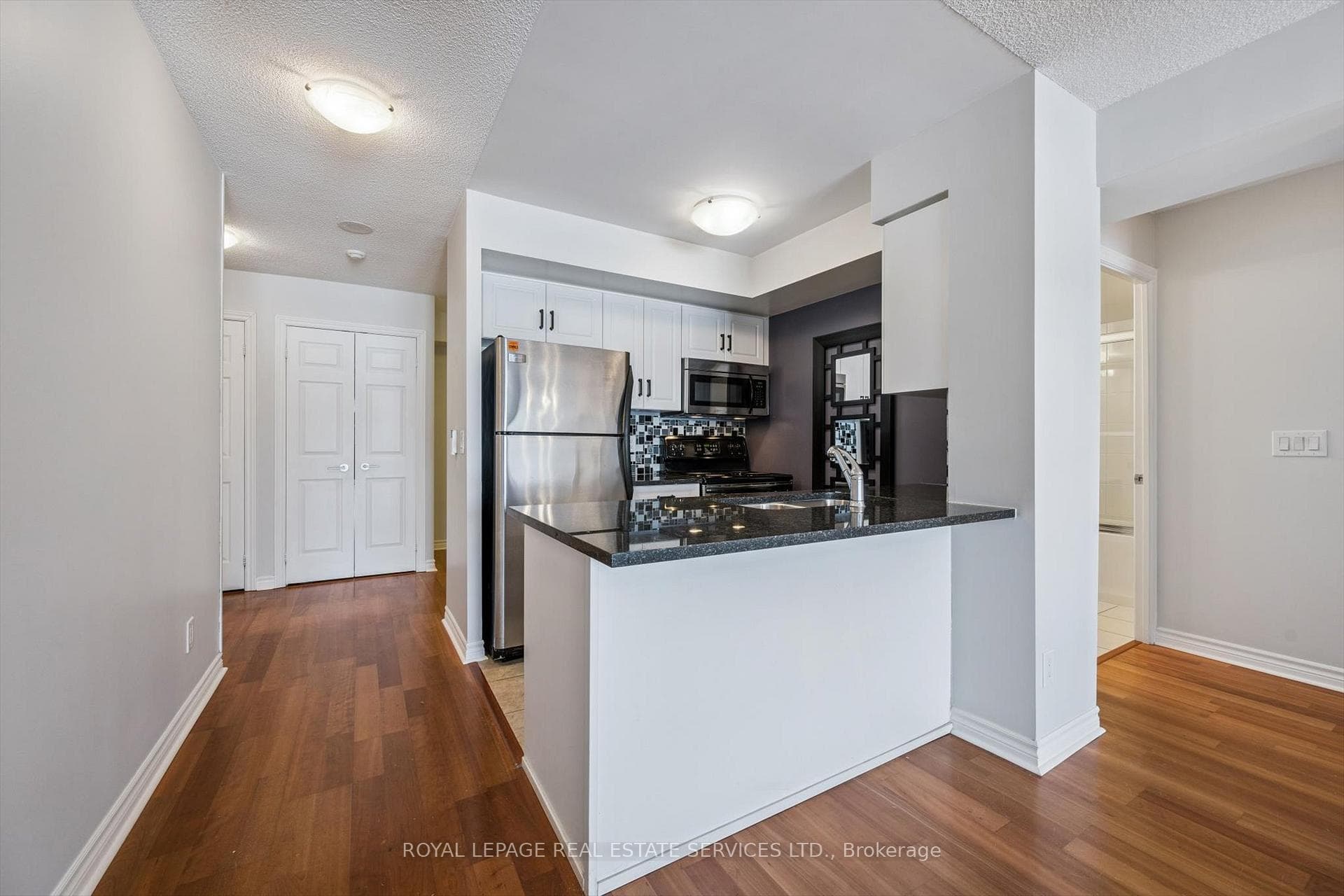 Kitchen with Granite Countertops & S/S Appliances