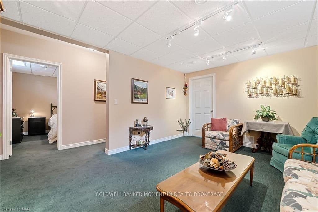 Family room leads to storage and utility rooms