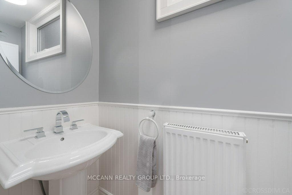 Powder room with pedestal sink.