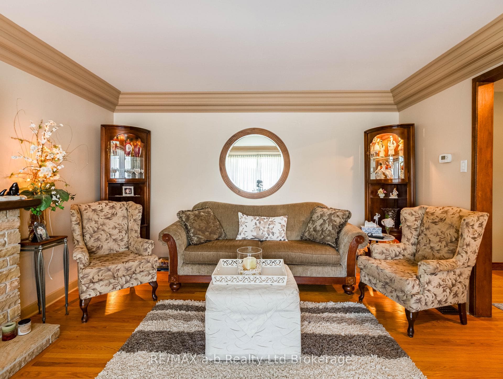 Front main living area with wood burning fireplace