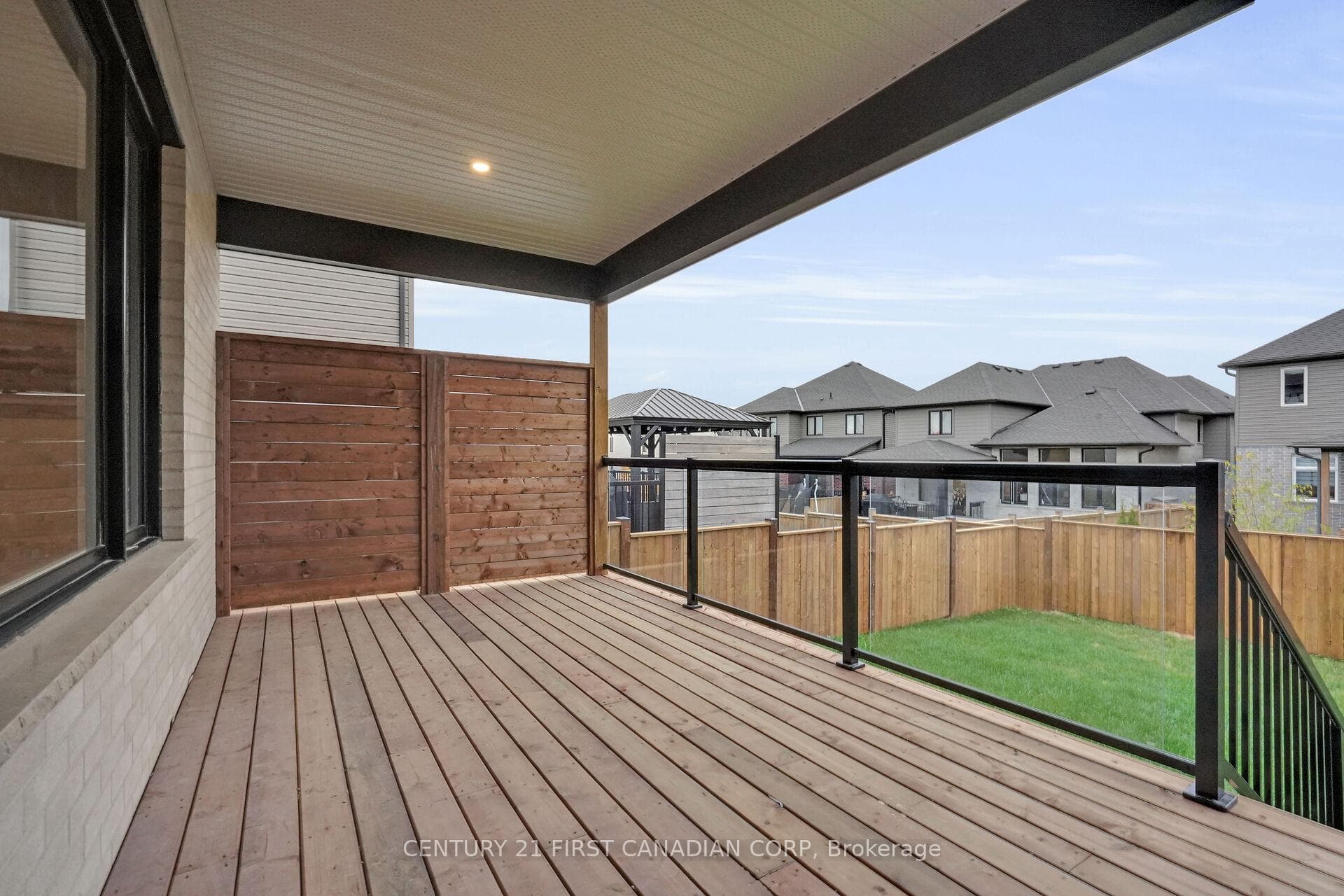 Privacy wall and fenced yard