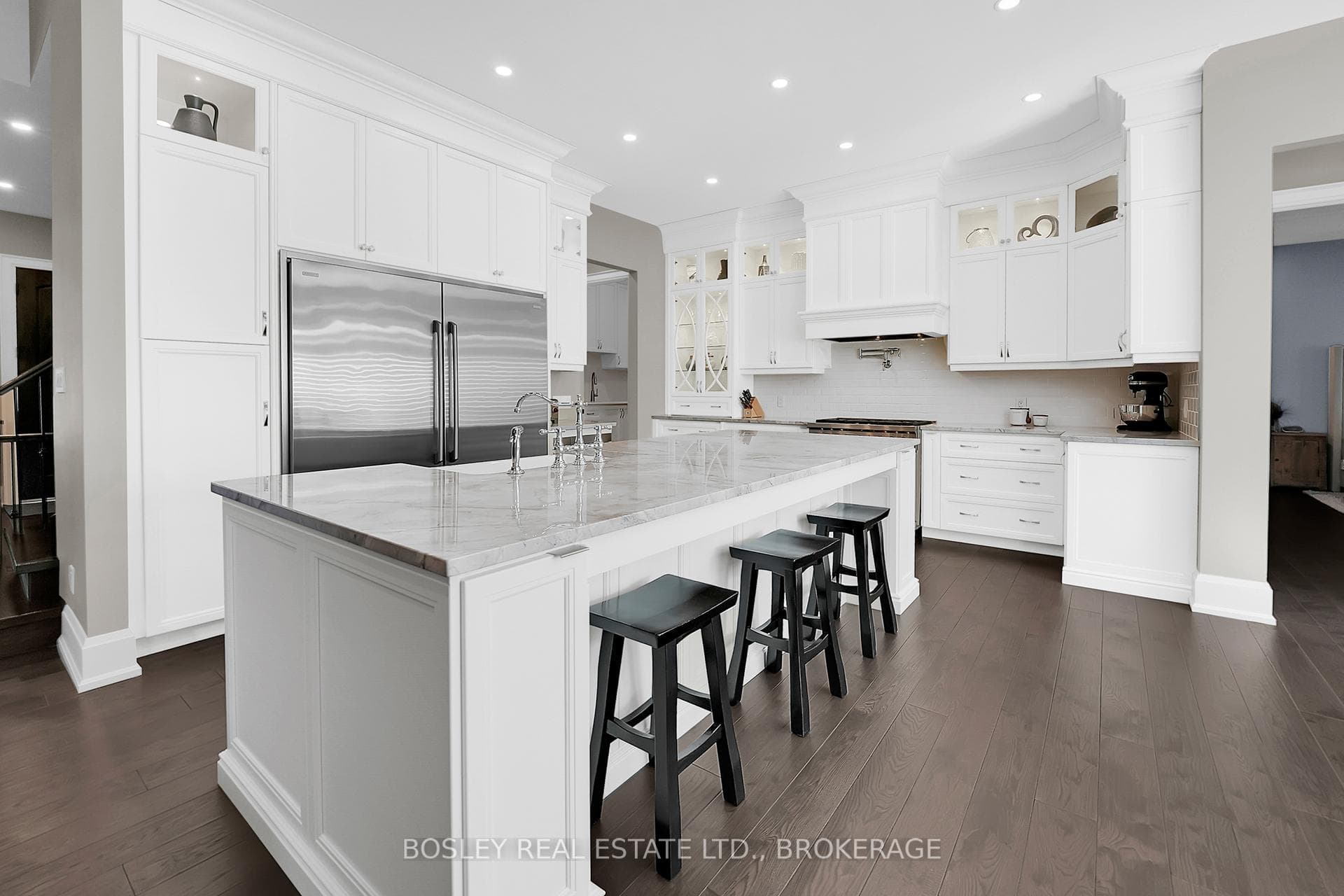 appliances, custom cabinetry, pantry and 10 ft .