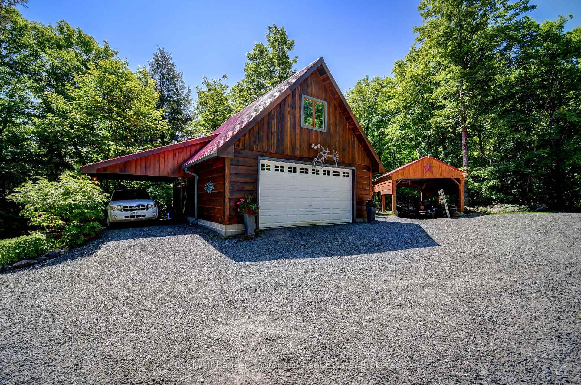 Double Detached Garage with Carport