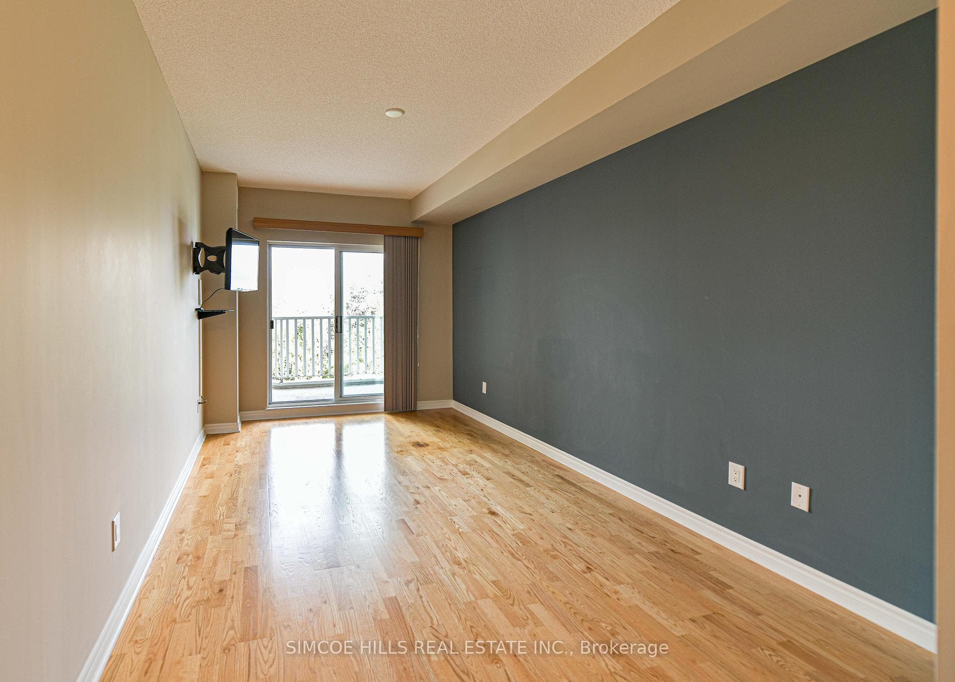 Primary bedroom with walkout to balcony