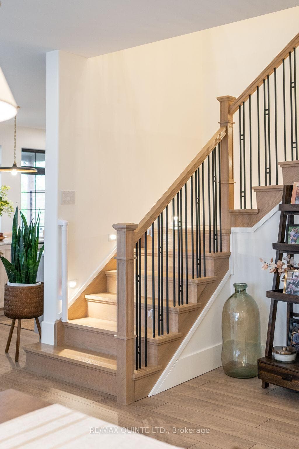 wood staircase with tread lights