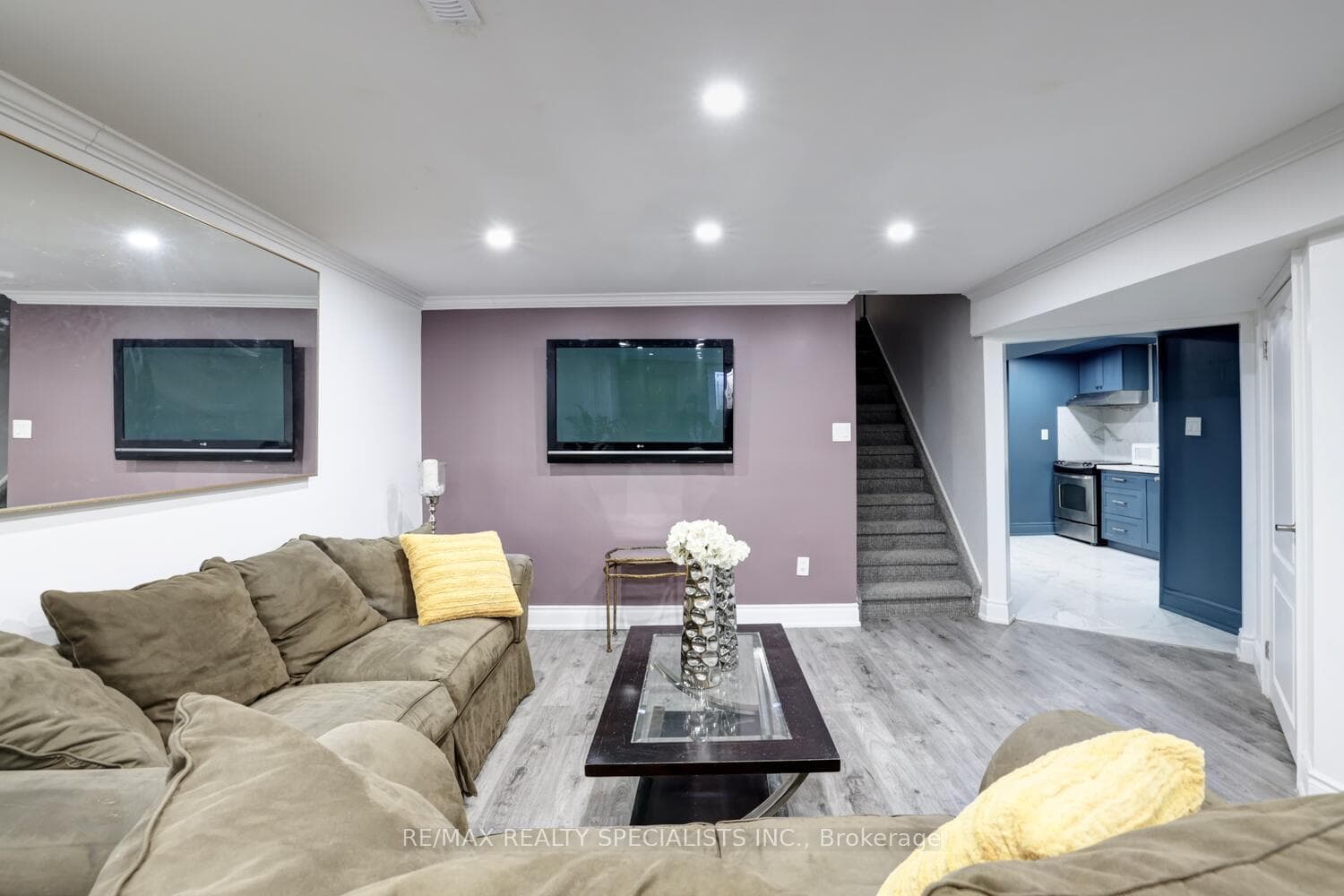 Lower level living room. LED pot lights.