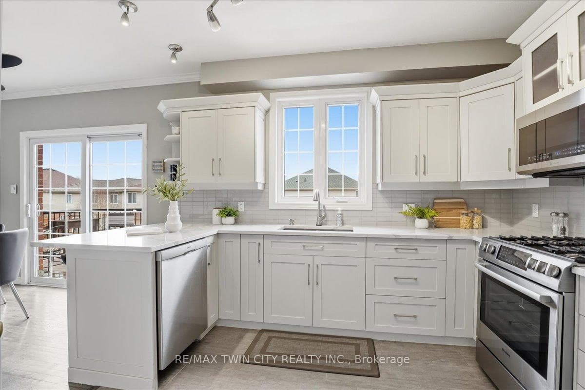 Quartz countertops and undermounted sink.